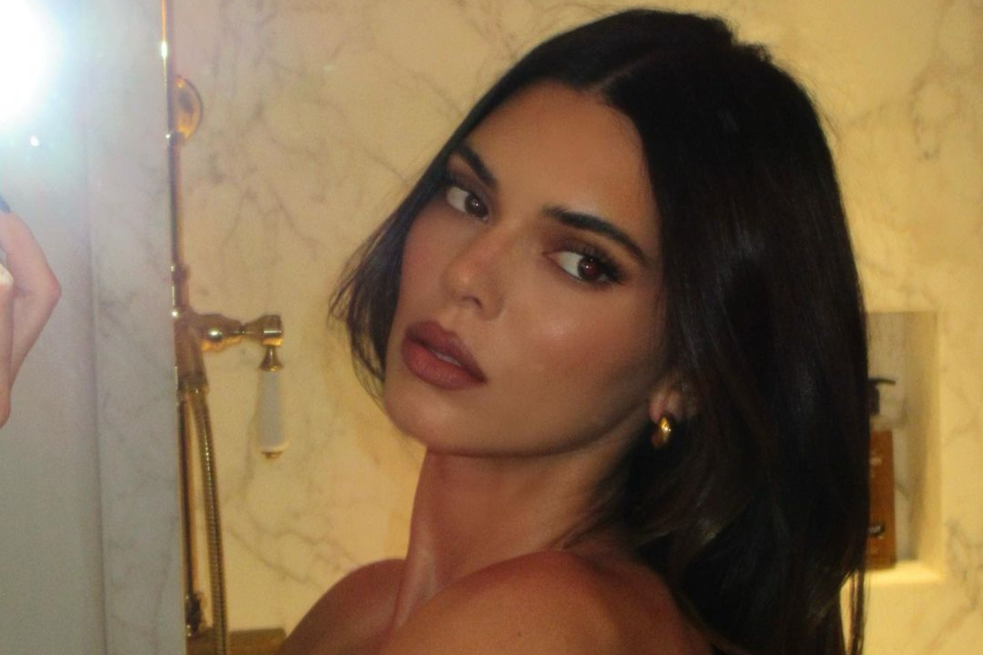 Kendall Jenner stuns in bold attire for a night out with the girls