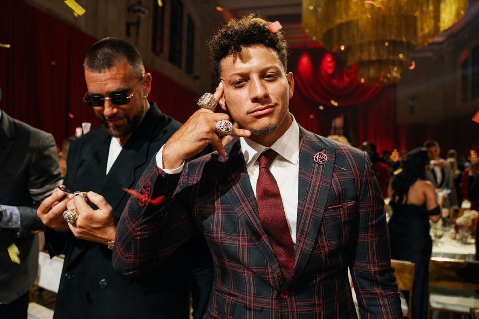 Patrick Mahomes showing off his two Super Bowl rings.