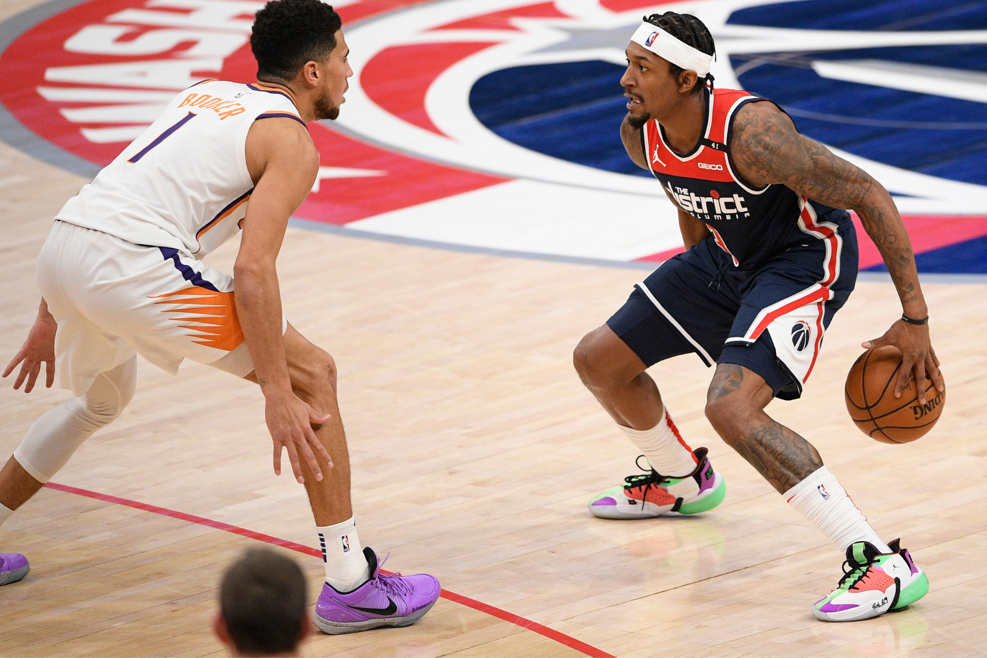 New teammates Booker and Beal will fight for a championship in Phoenix.