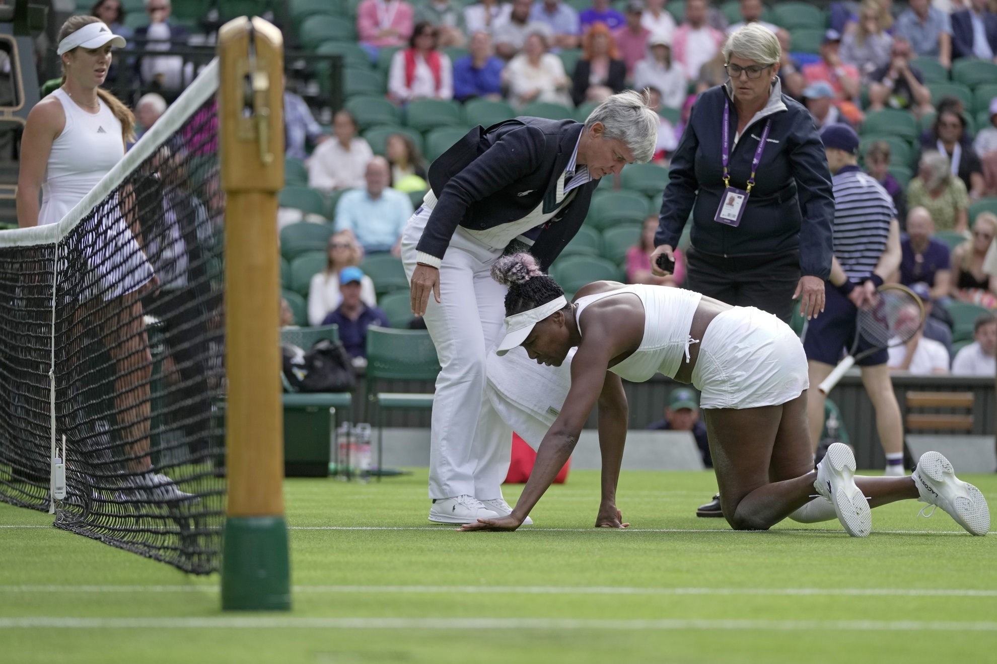 Venus Williams Britain Wimbledon Tennis Officials assist slipped Ukraine Elina Svitolina first round women singles championships London
