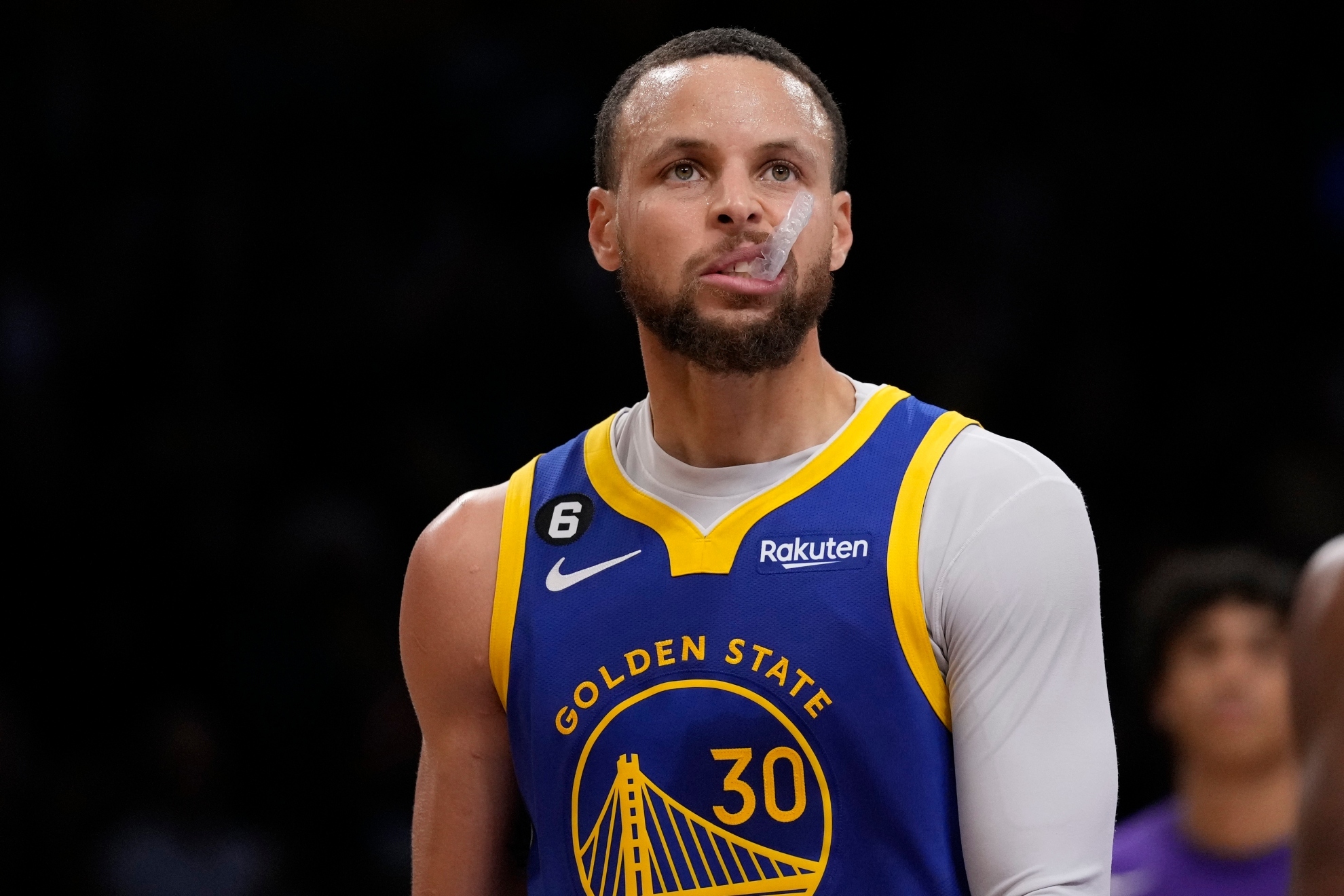 Stephen Curry playing for the Warriors.