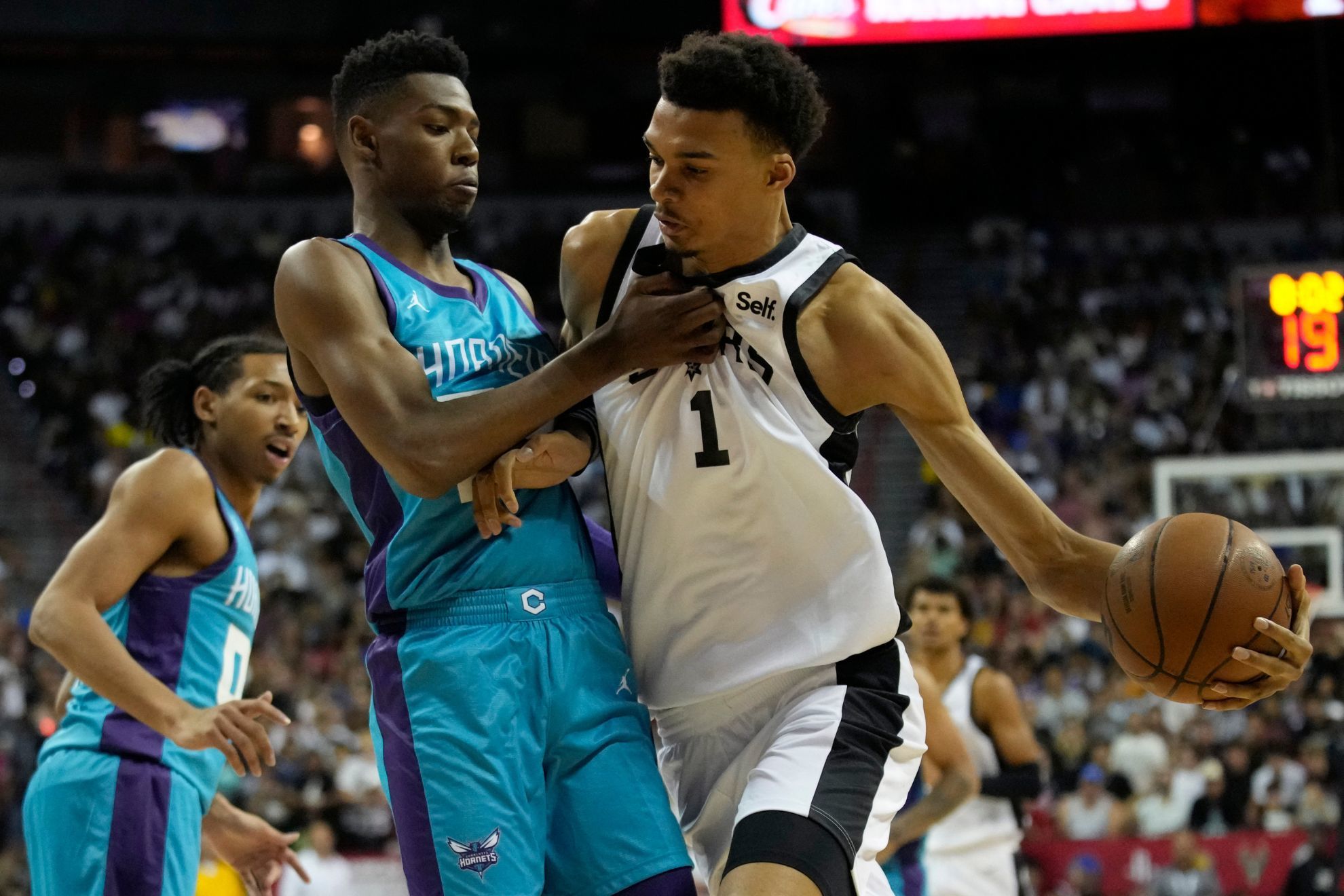 Wembanyama suffers two welcome to the NBA moments in Summer League debut