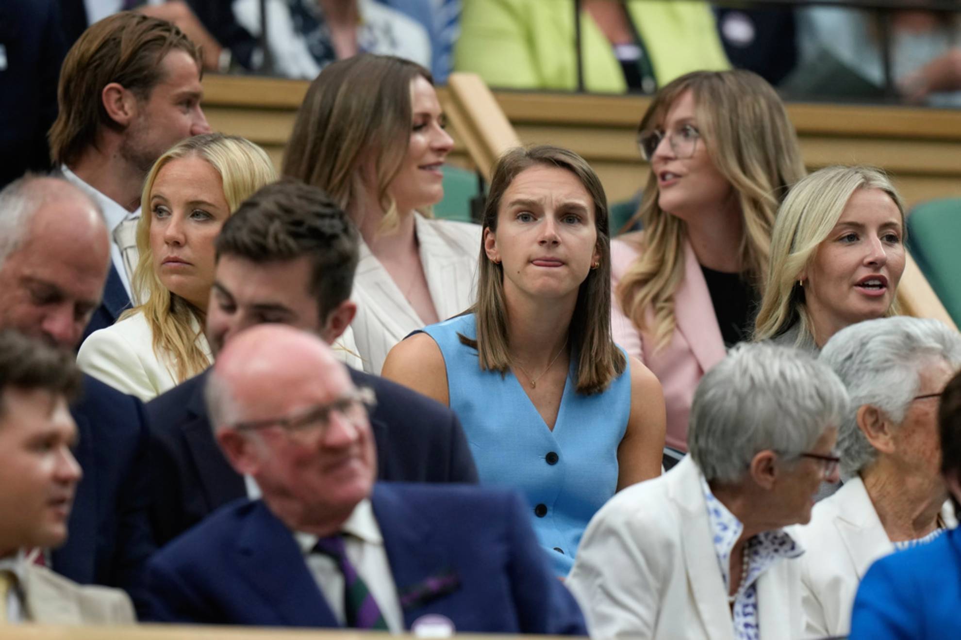 Soccer players Leah Williamson, Vivianne Miedema and Beth Mead, from right, take their seats in the Royal Box /