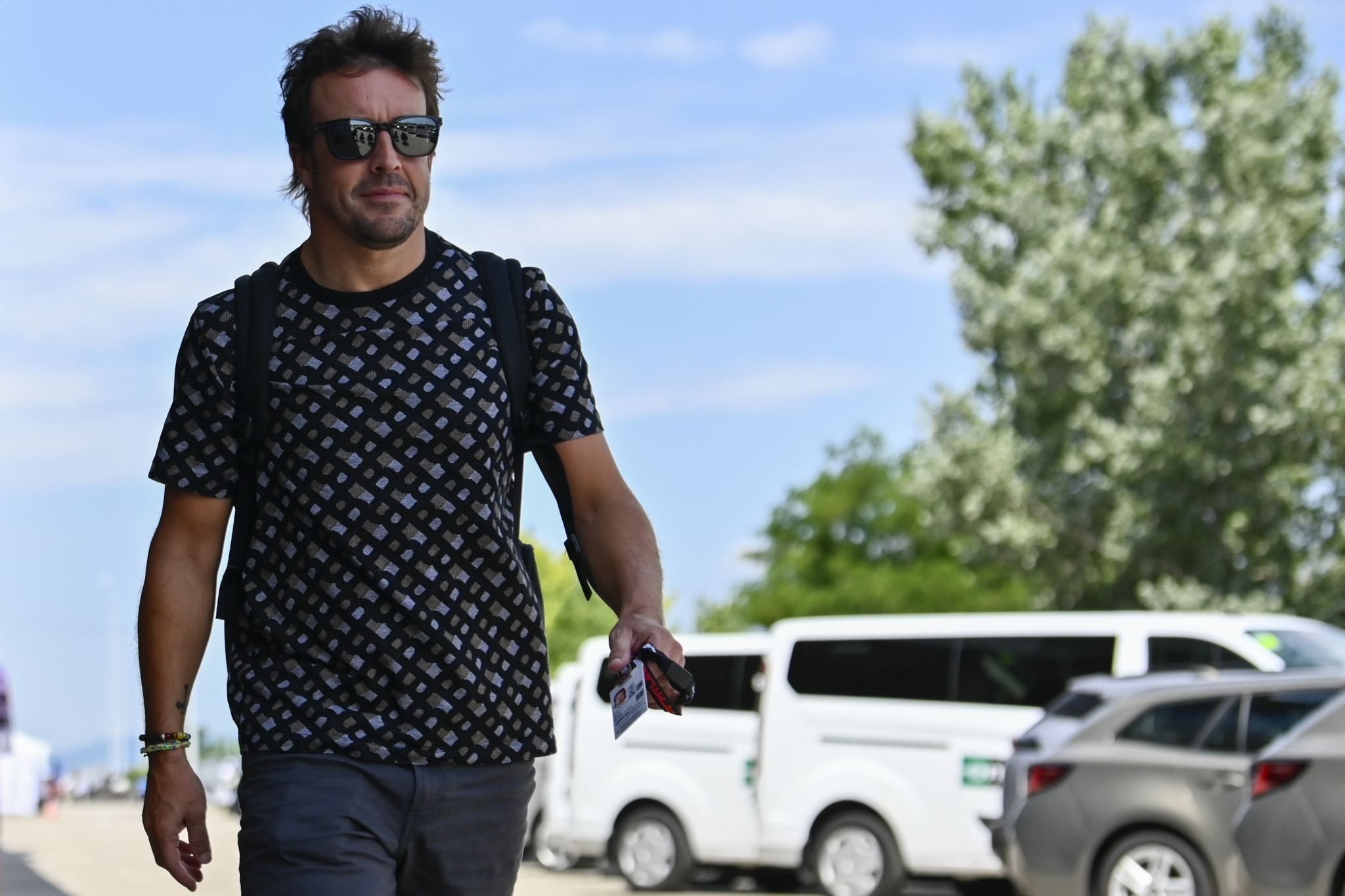 Spanish Formula One driver Fernando lt;HIT gt;Alonso lt;/HIT gt; of Aston Martin arrives in the paddock ahead of the Hungarian Formula One Grand Prix at the Hungaroring racetrack in Mogyorod, near Budapest, Hungary, Thursday, July 20, 2023. The Hungarian F1 Grand Prix is held on Sunday, July 23, 2023. (AP Photo/Denes Erdos)