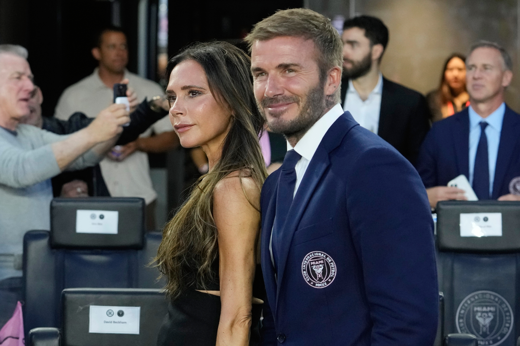 Victoria Beckham revives as Spice Girl as David dances and admires her