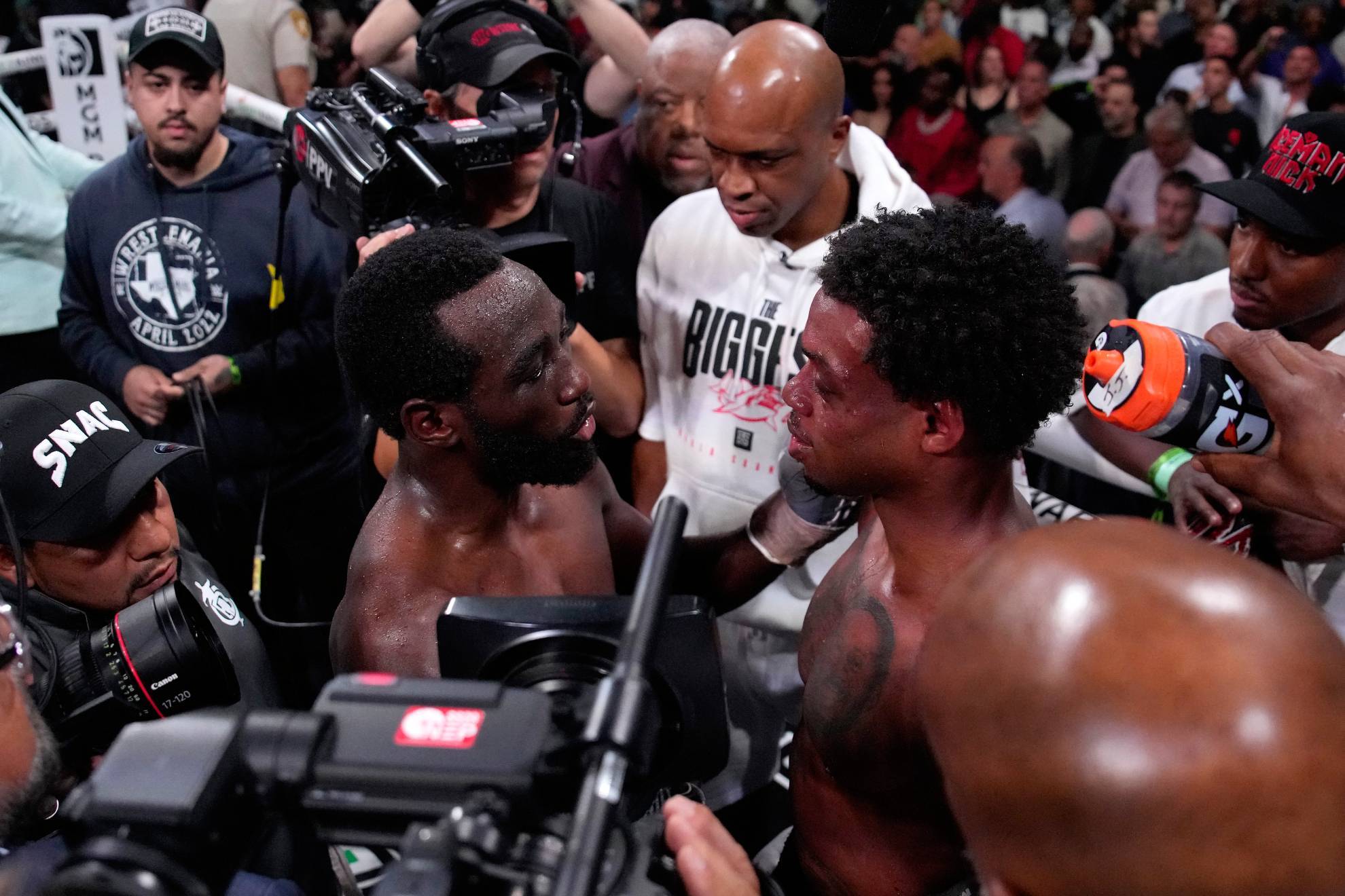 Terence Crawford, left, talks with Errol Spence Jr. fight after Crawford won /