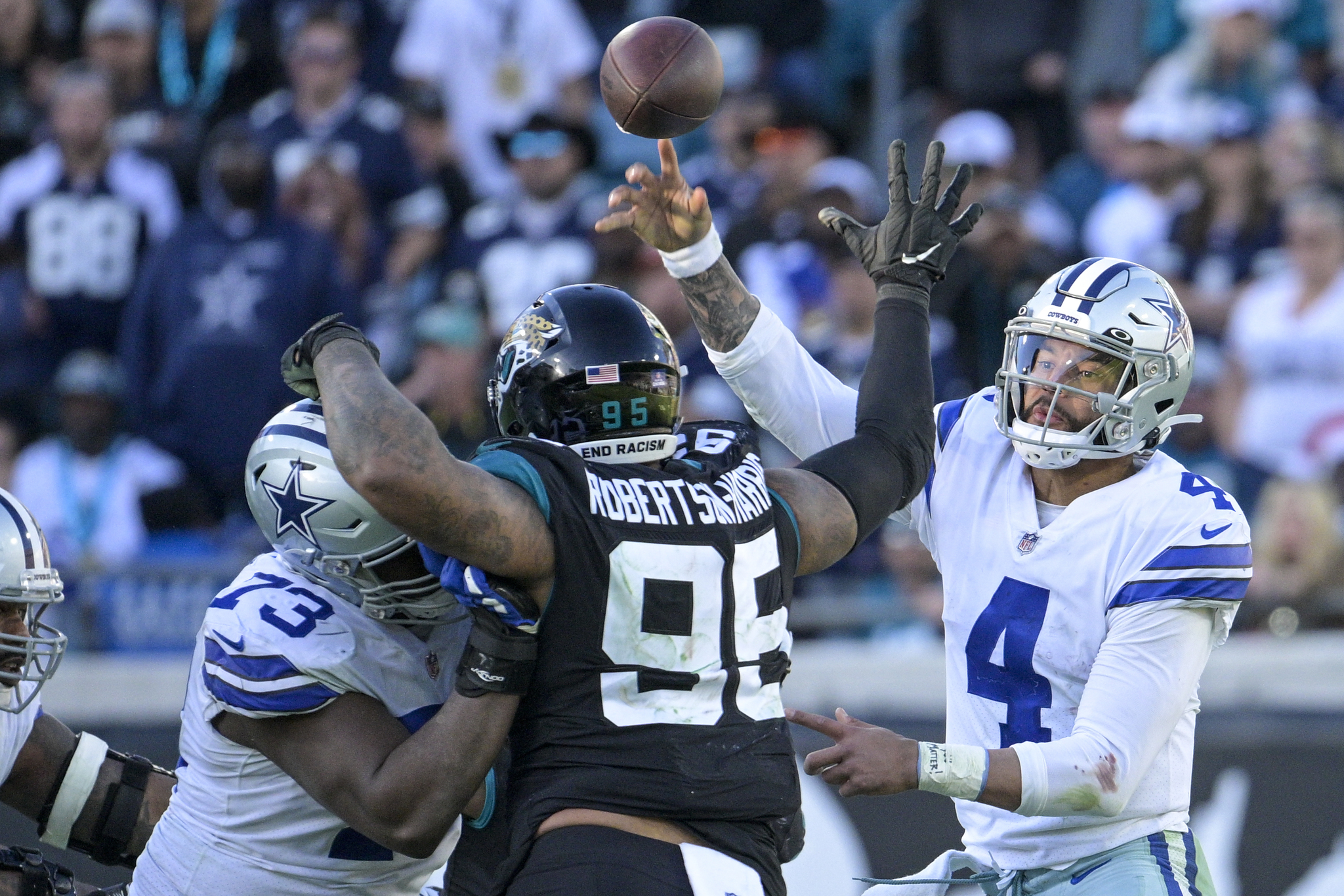 Dallas Cowboys quarterback throws an interception pass against Jacksonville Jaguars the last time they played in Jacksonville.