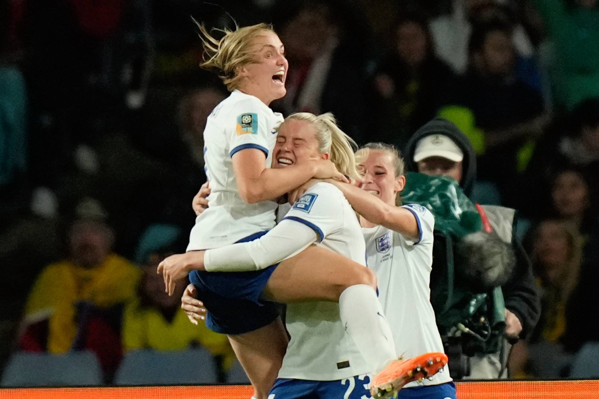 England's Alessia Russo, center, celebrates after scoring her side's 2nd goal
