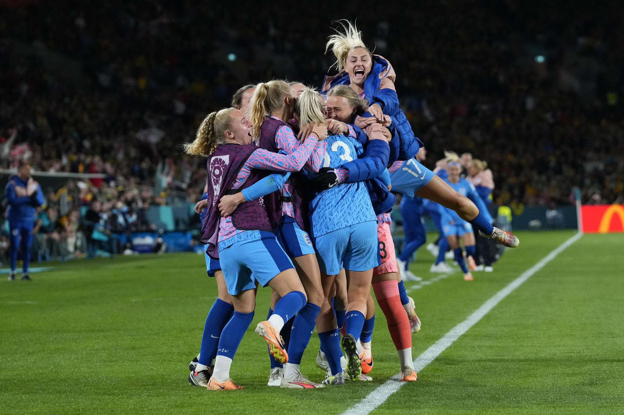 England players celebrate after Alessia Russo scored her side's third goal