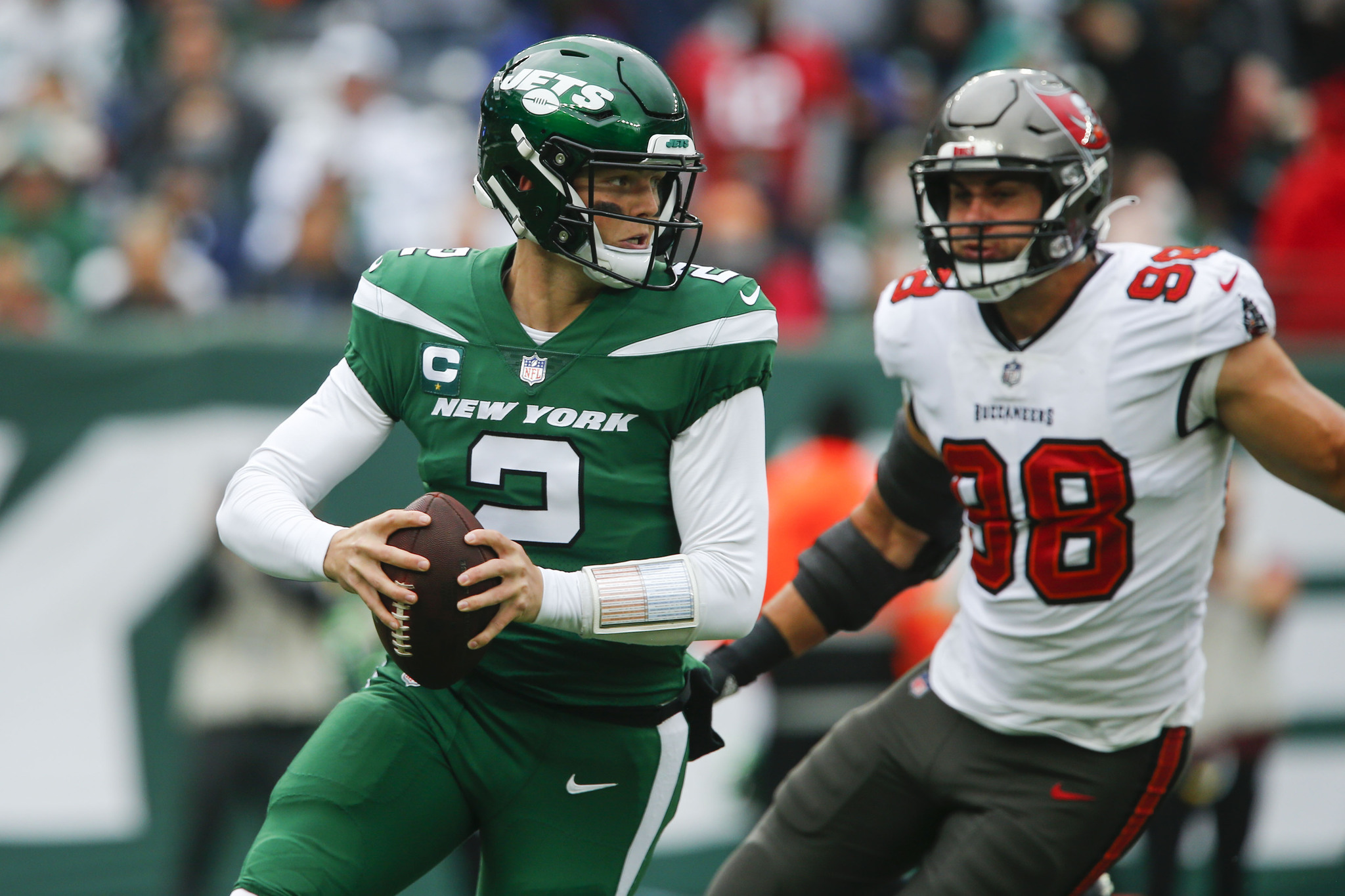 New York Jets Zach Wilson looks to throw during the first half of an NFL football game against the Tampa Bay Buccaneers.