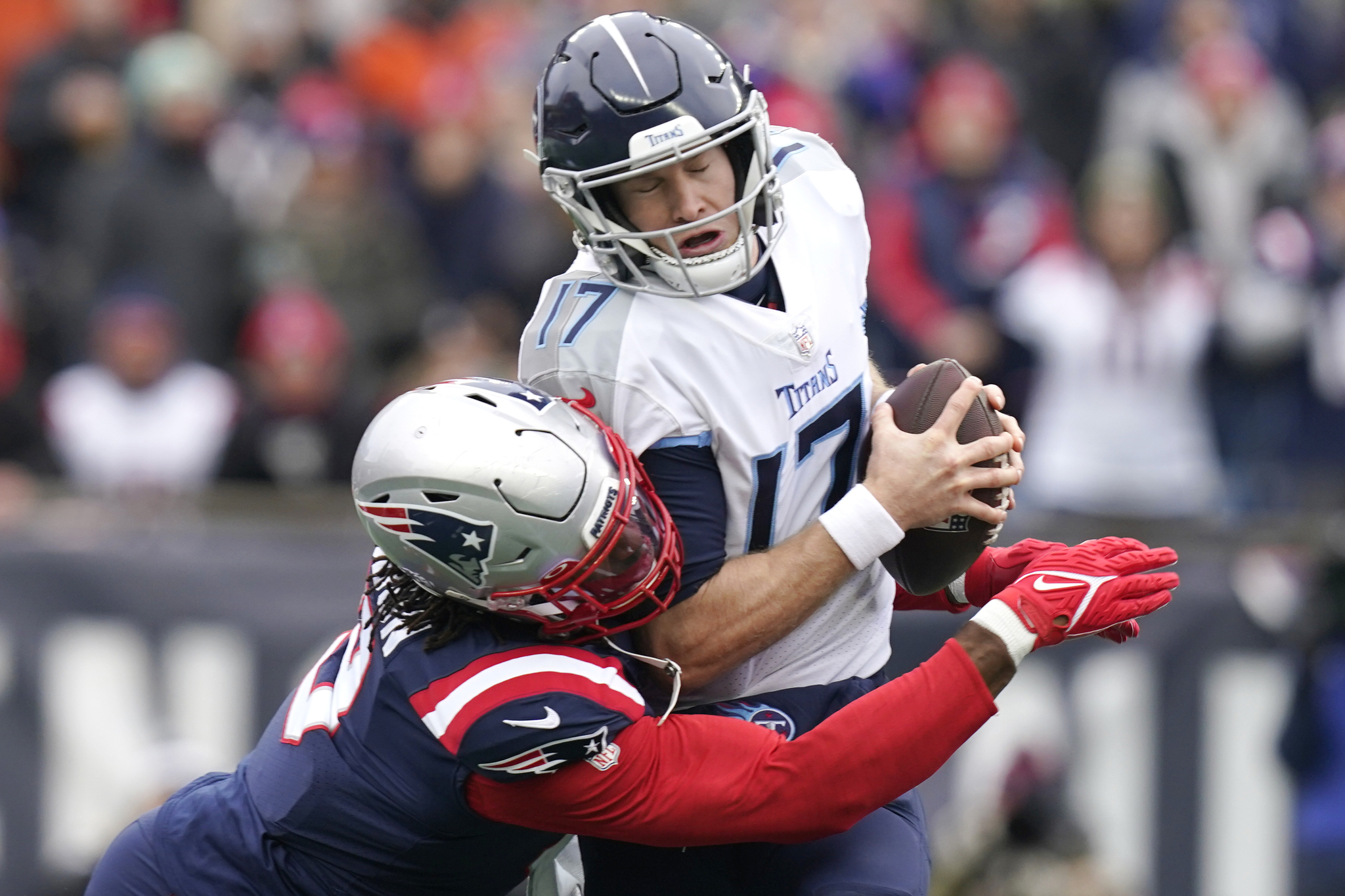 Tennessee Titans quarterback is sacked by New England Patriots outside linebacker Matt Judon.