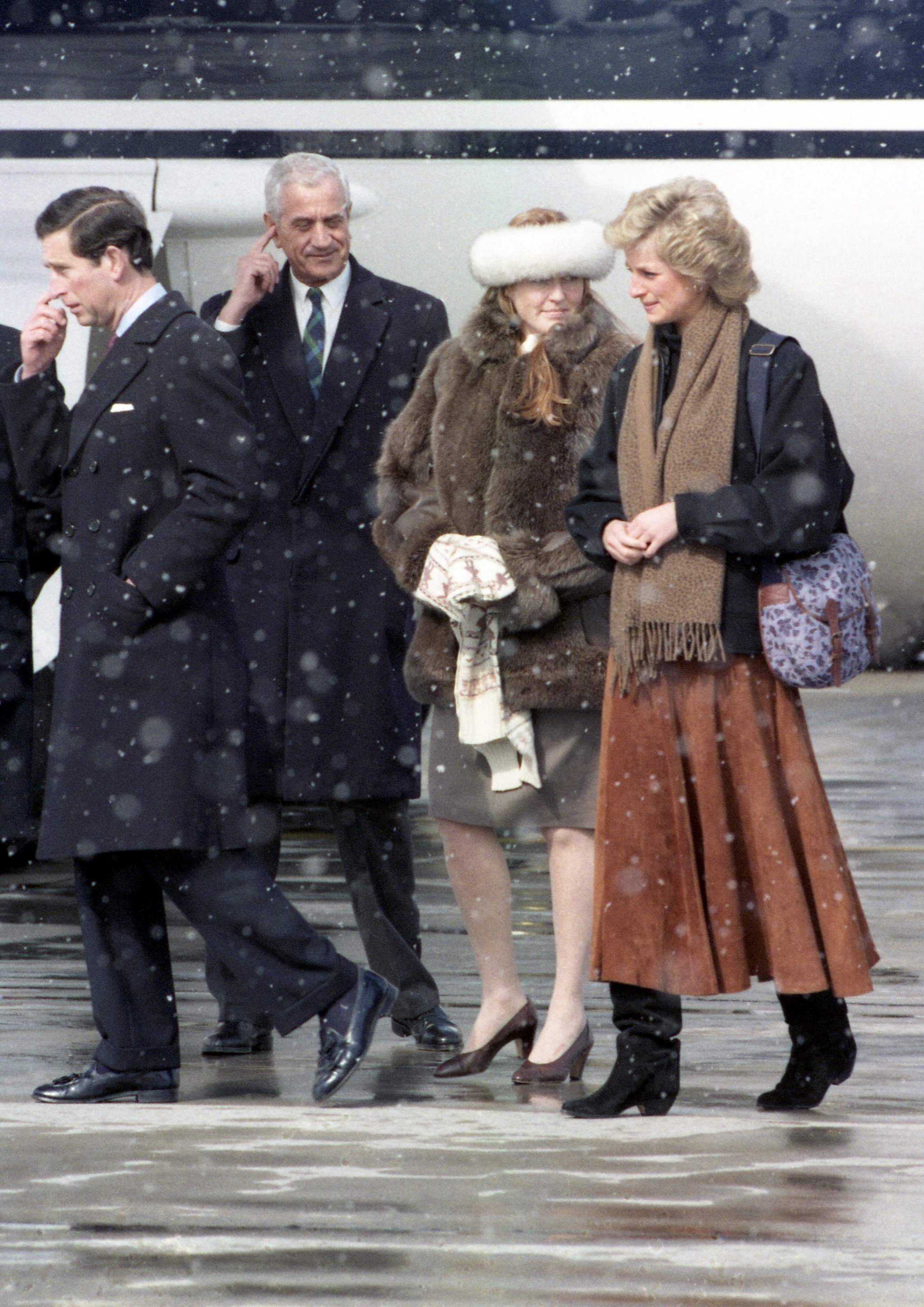 Prince Charles, Sarah Ferguson, the Duchess of York and Princess Diana, Princess of Wales, at Zurich airport in March, 1988