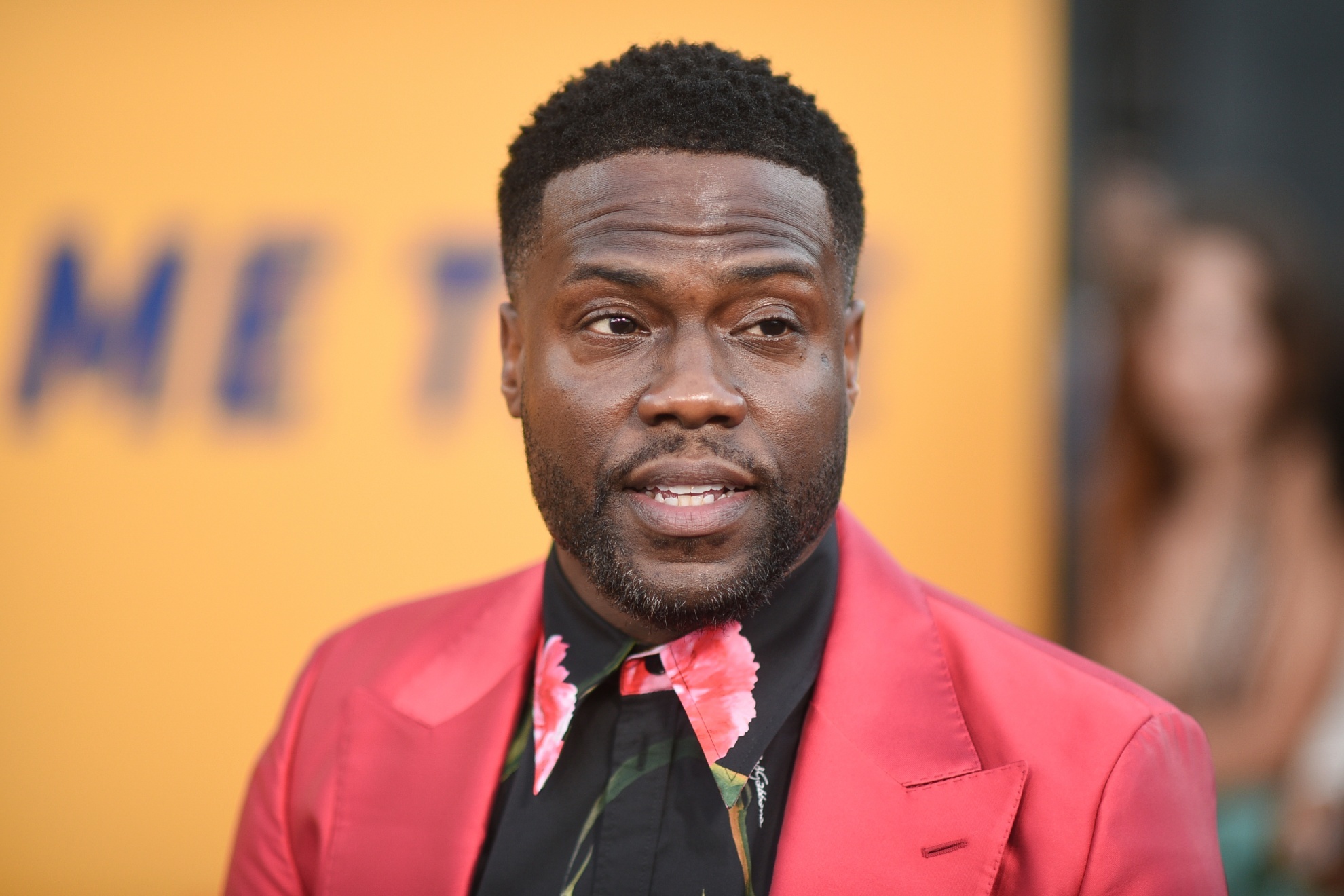 Kevin Hart is in a wheelchair, and Tom Brady gets playfully blamed for the  mishap