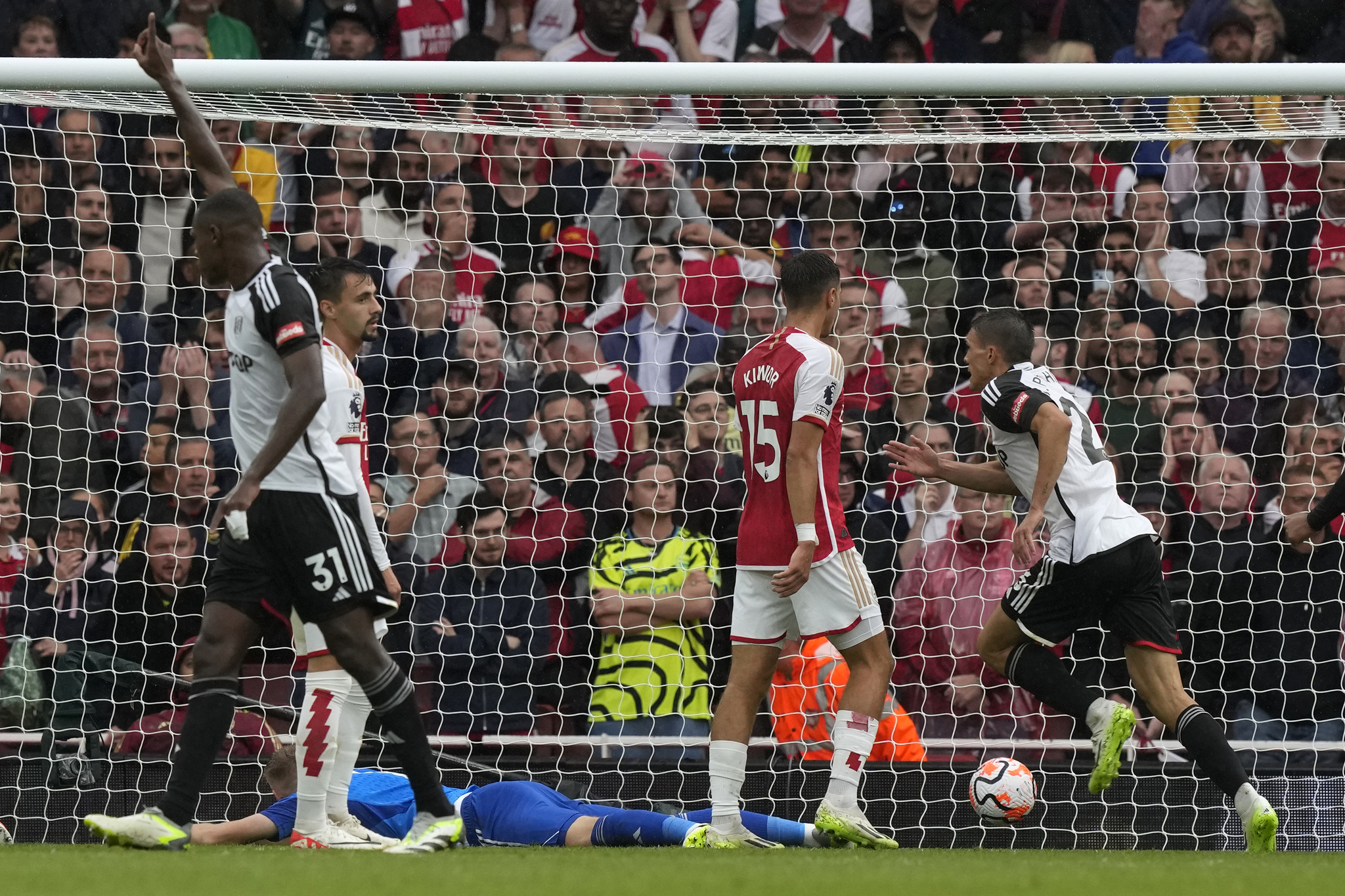 Fulham's Joao Palhinha, right, scores his side's second goal