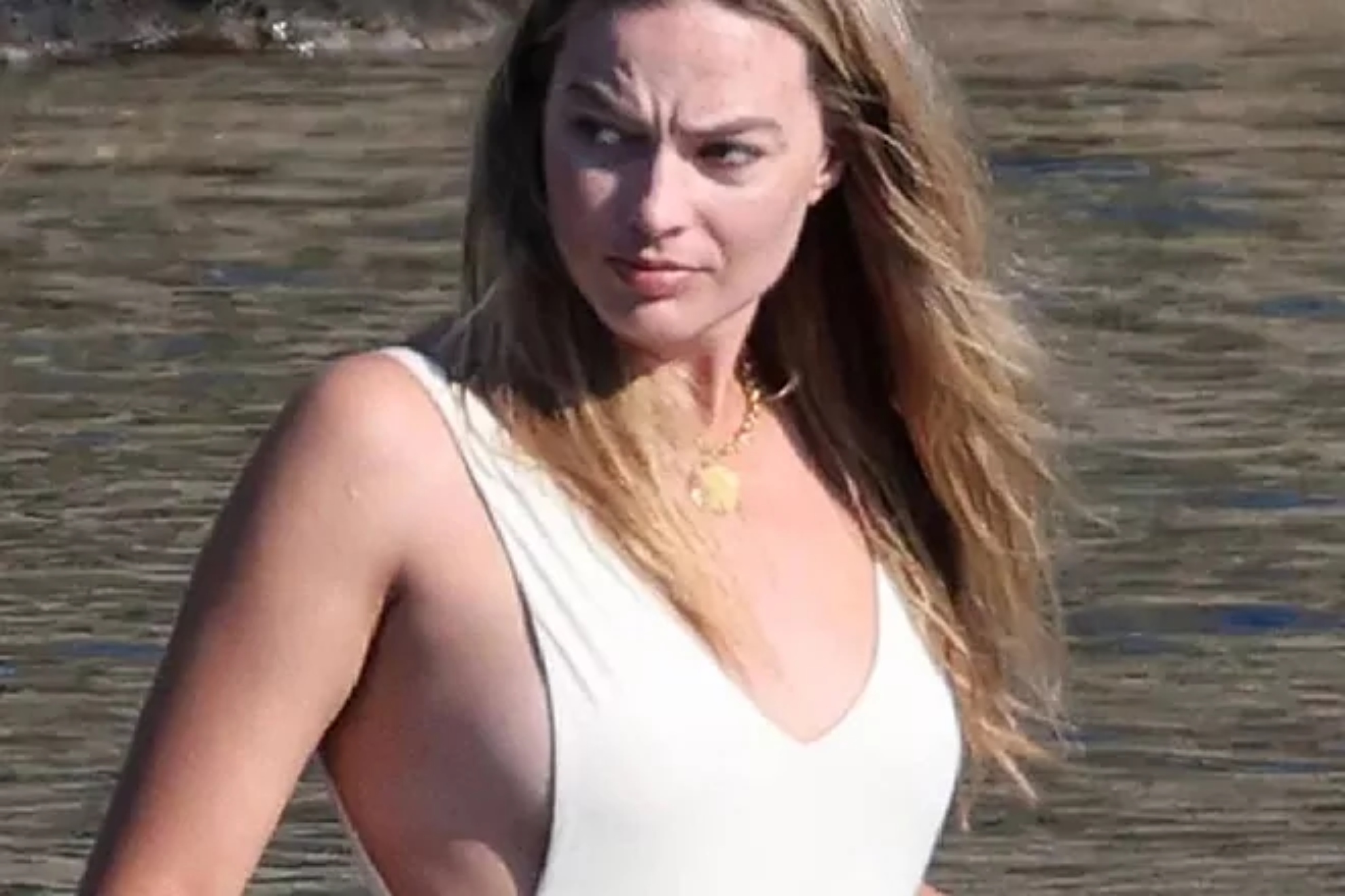 Margot Robbie looking stunning in white tankini during idyllic Greek getaway