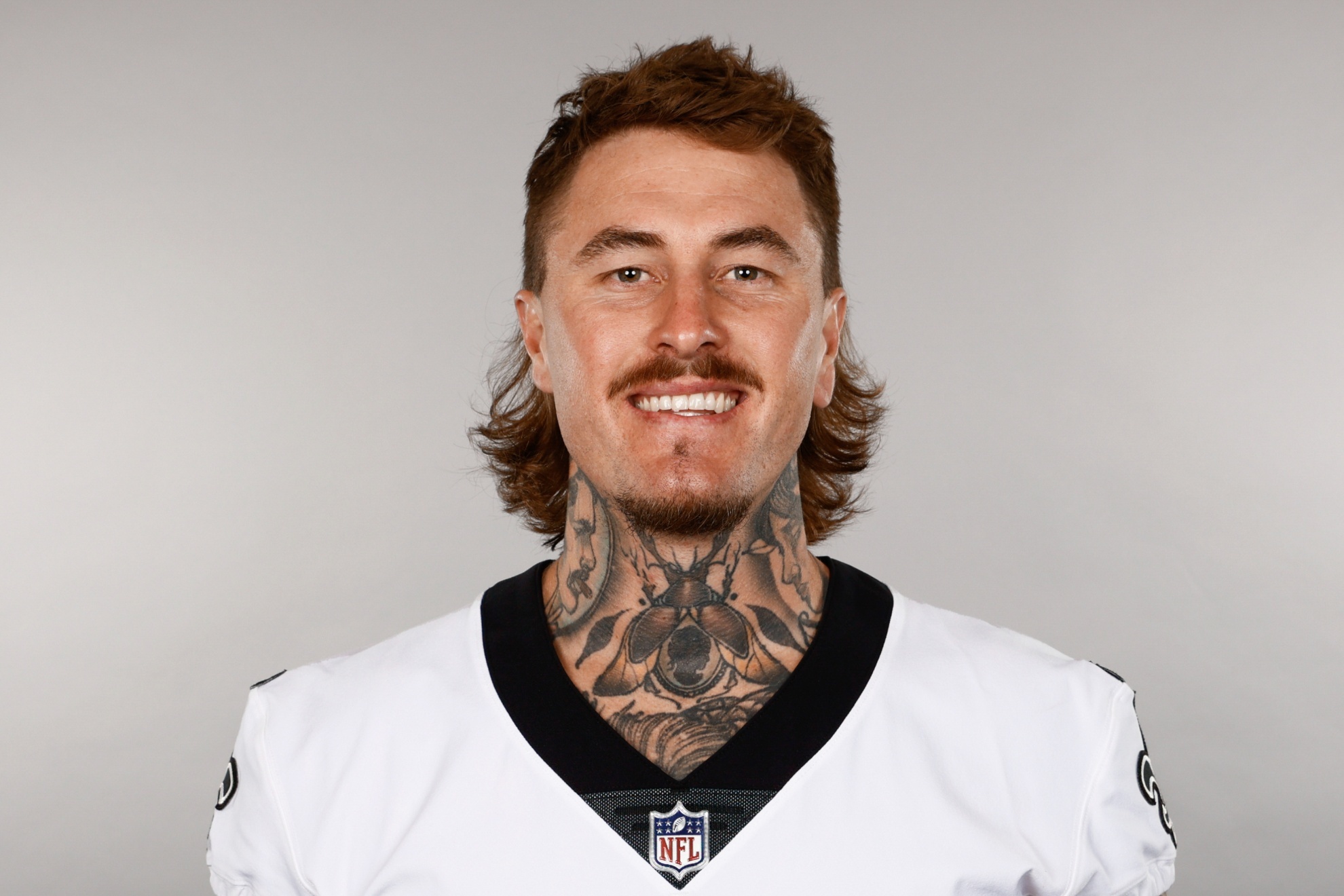 Australian punter Lou Henley's journey to the NFL included a tattoo parlor in Bali