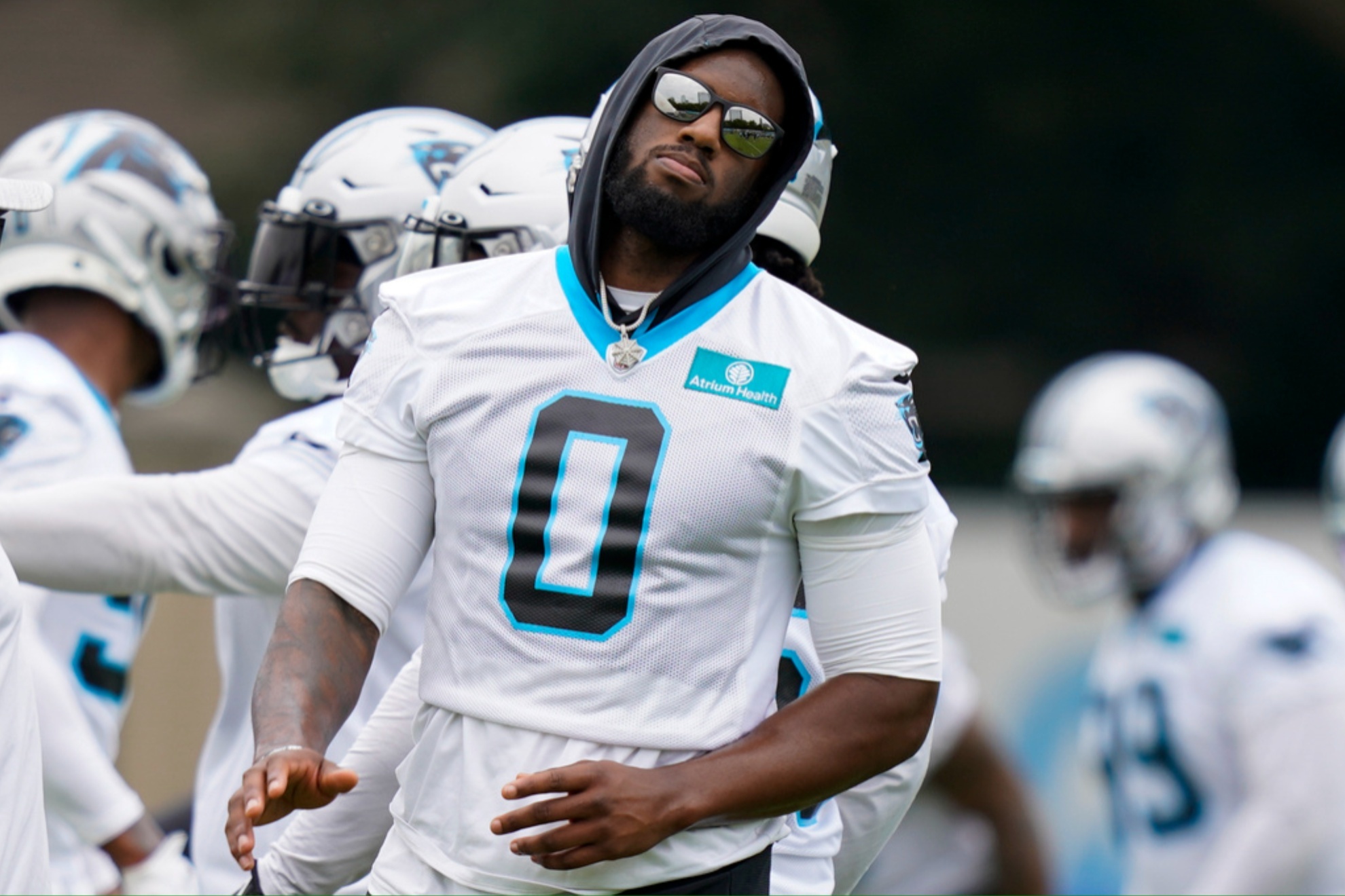 Carolina Panthers' Brian Burns was absent from the team's facilities on Monday