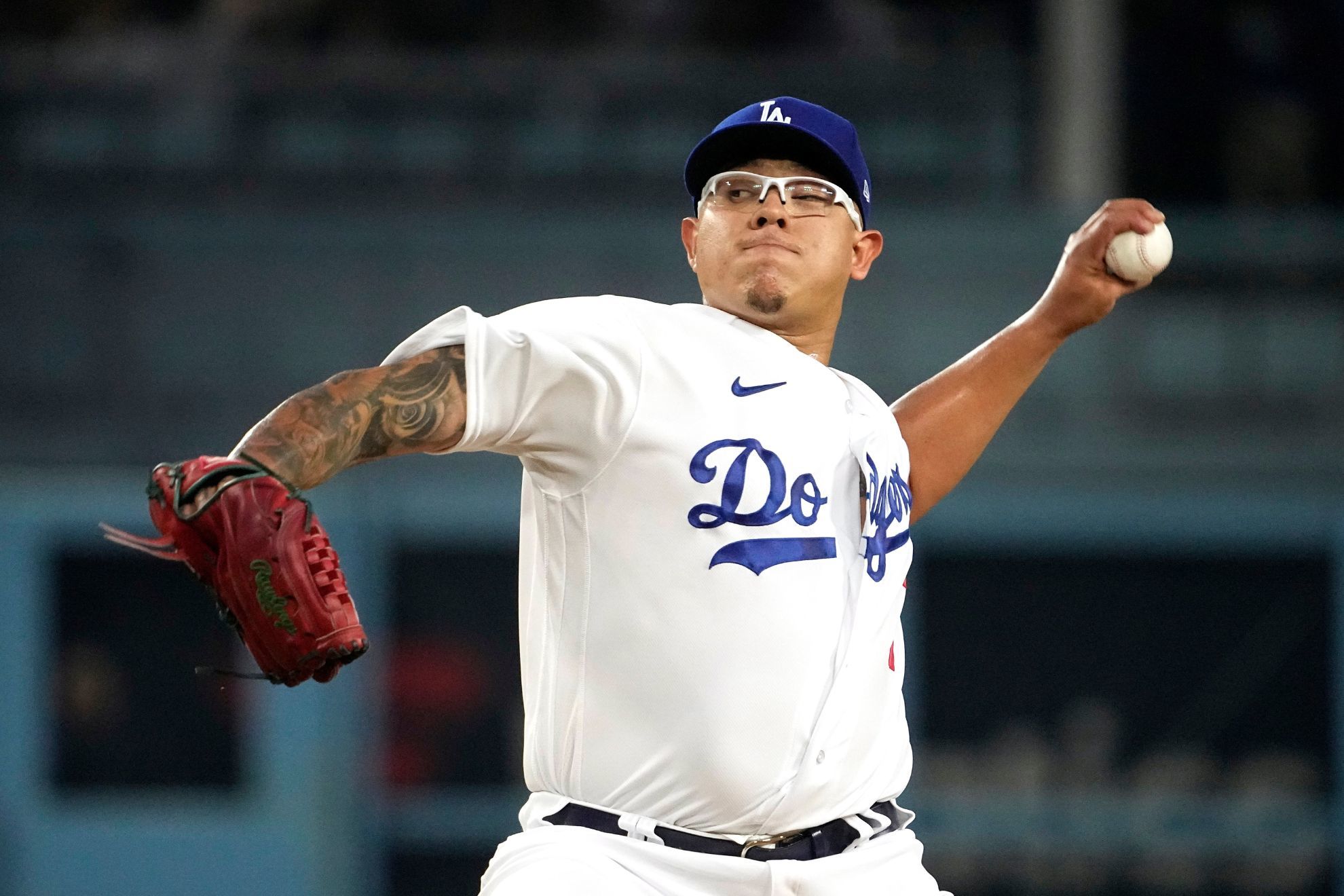 What will happen to Julio Urias after his arrest for domestic violence?
