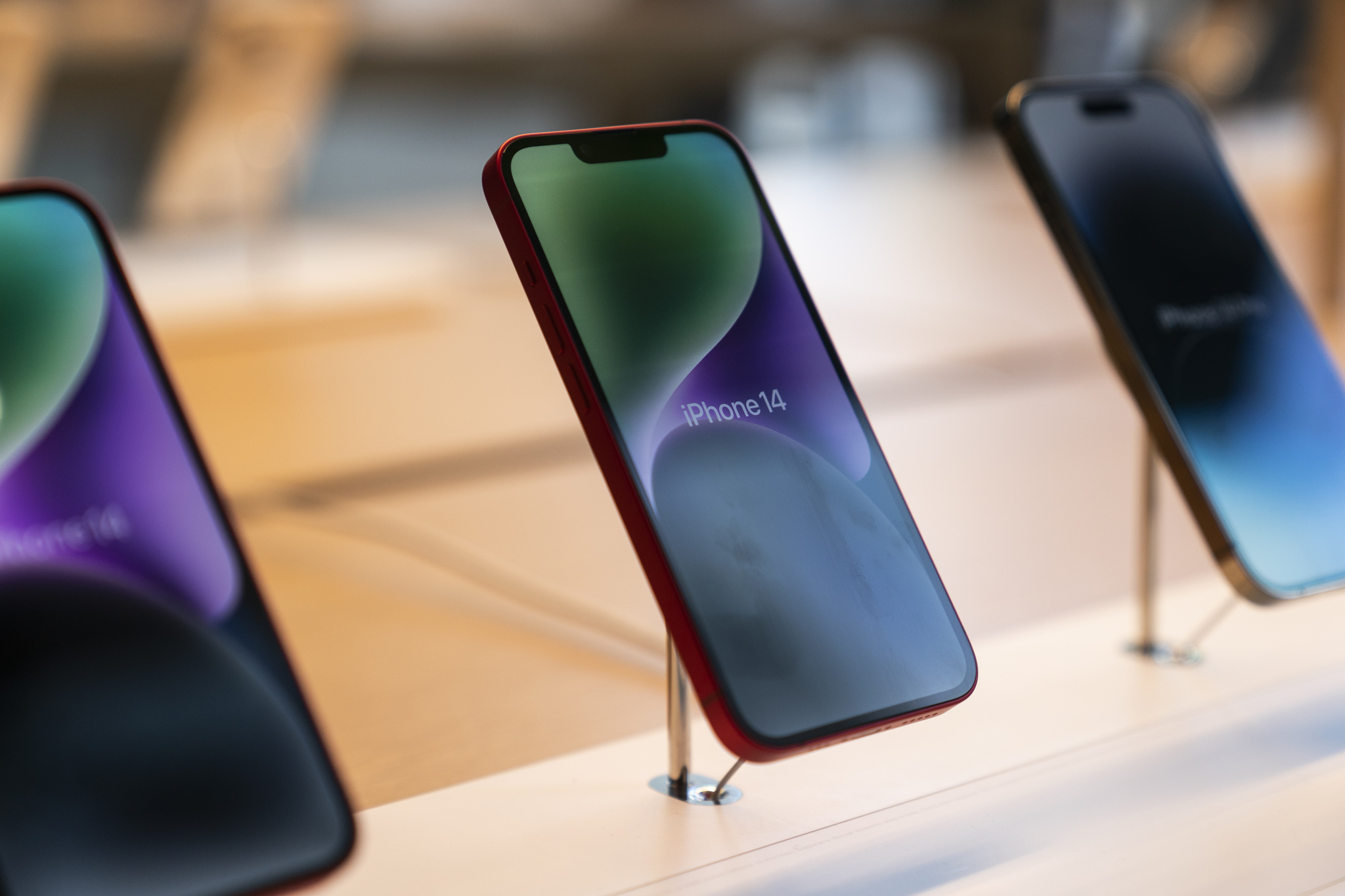 FILE - Apple lt;HIT gt;iPhone lt;/HIT gt; 14 phones sit on display at an Apple Store at The Grove in Los Angeles, Sept. 16, 2022. Apple released a significant security update for lt;HIT gt;iPhones lt;/HIT gt; and iPads Thursday, Sept. 7, 2023, to patch newly discovered security vulnerabilities in the devices' system software. (AP Photo/Jae C. Hong, File)