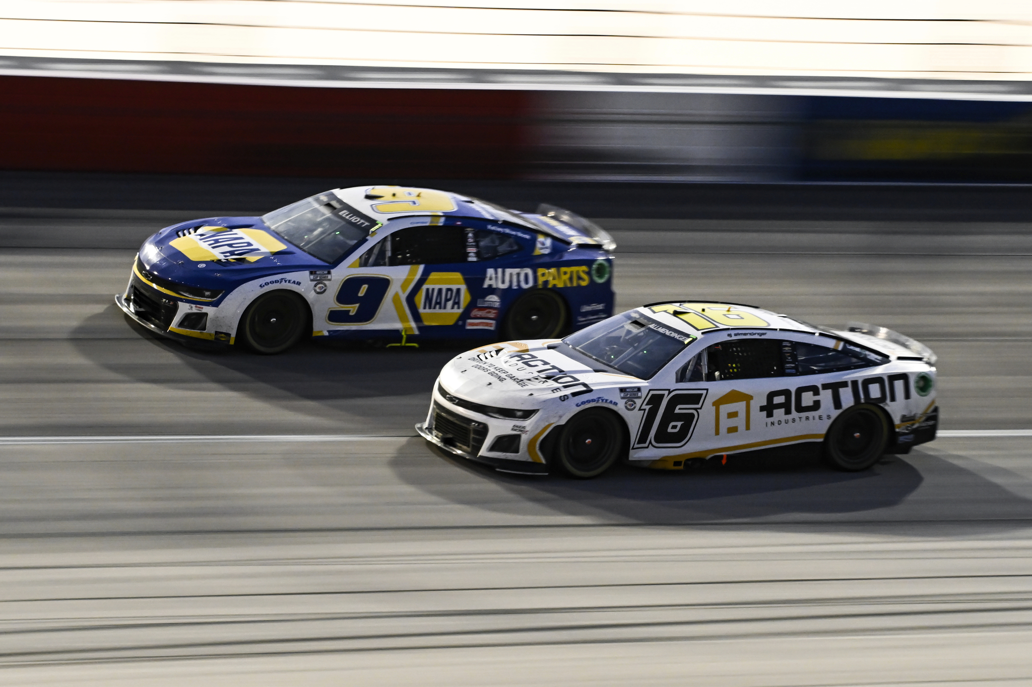 AJ Allmendinger (16) looks to pass Chase Elliott coming out of Turn 4 during a NASCAR Cup Series auto race at Darlington Raceway