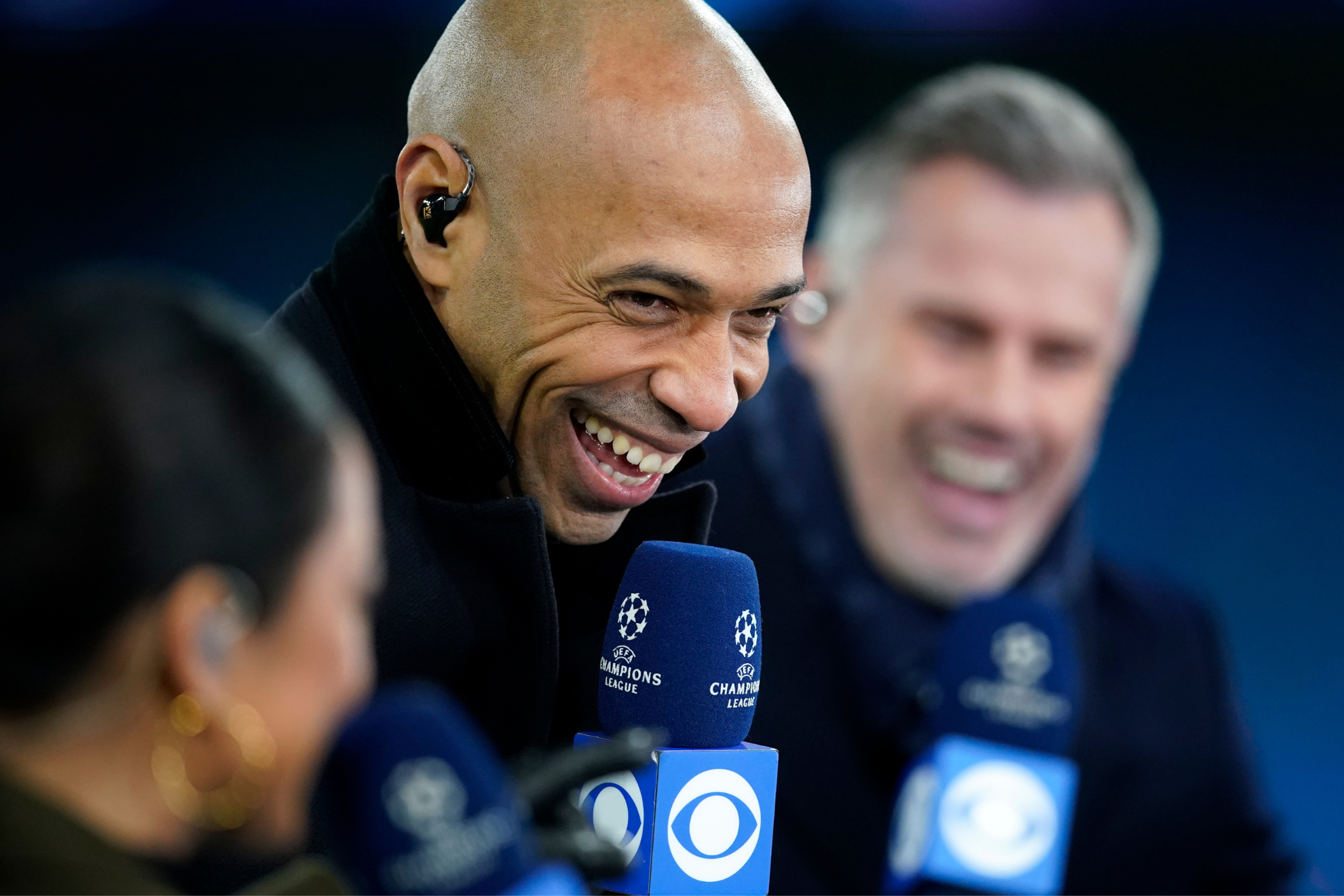 Henry (foreground) and Carragher (background) during a Champions League broadcast.