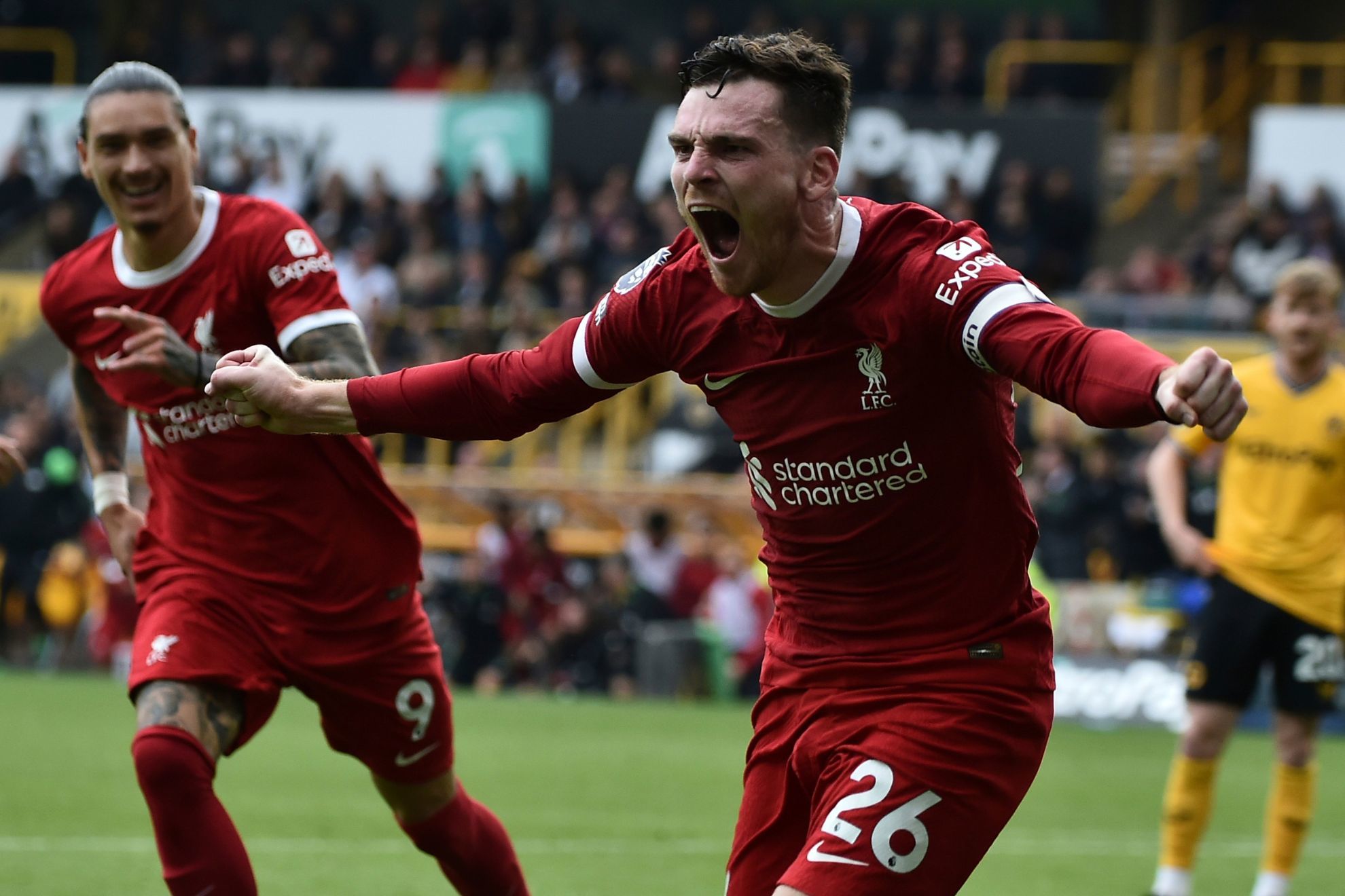 Liverpool's Andrew Robertson celebrates after scoring his side's second goal against Wolverhampton
