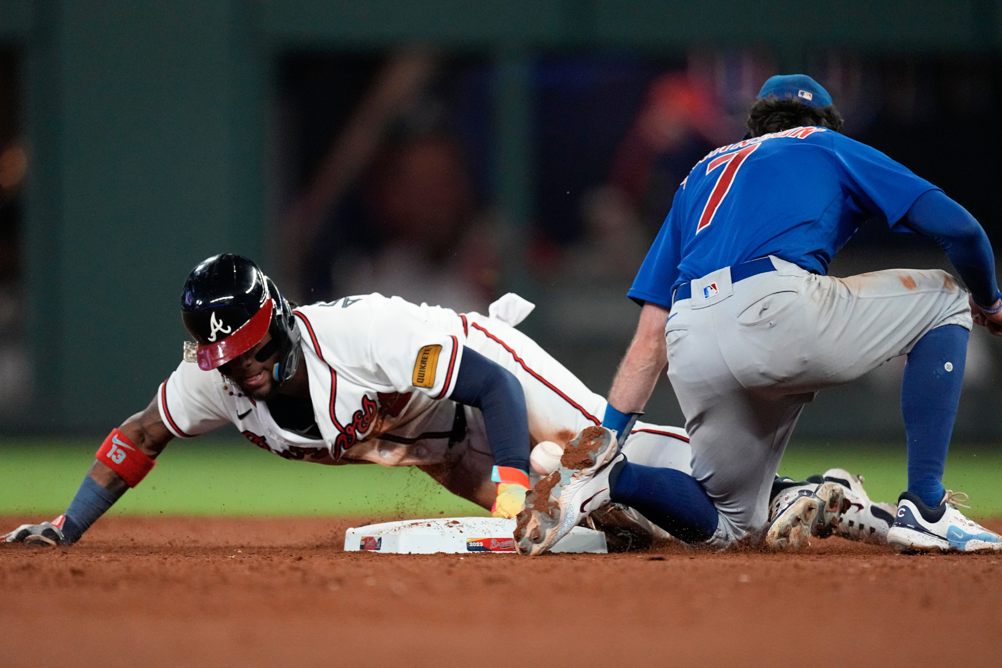 Acuña evades the tag from Dansby Swanson and steals his 70th base of 2023.