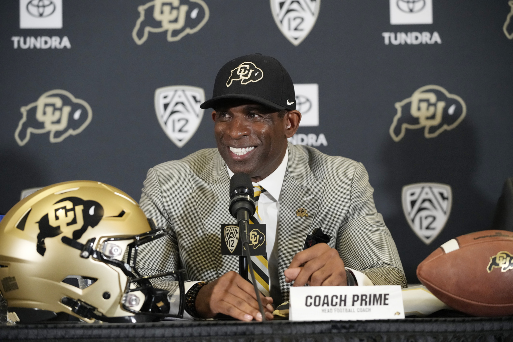 FILE - lt;HIT gt;Deion lt;/HIT gt; Sanders speaks after being introduced as the new head football coach at the University of Colorado during a news conference Sunday, Dec. 4, 2022, in Boulder, Colo. Floyd Keith has waited half a century for a Black coach with lt;HIT gt;Deion lt;/HIT gt; Sanders' swagger and success to shake up college football. (AP Photo/David Zalubowski, File)