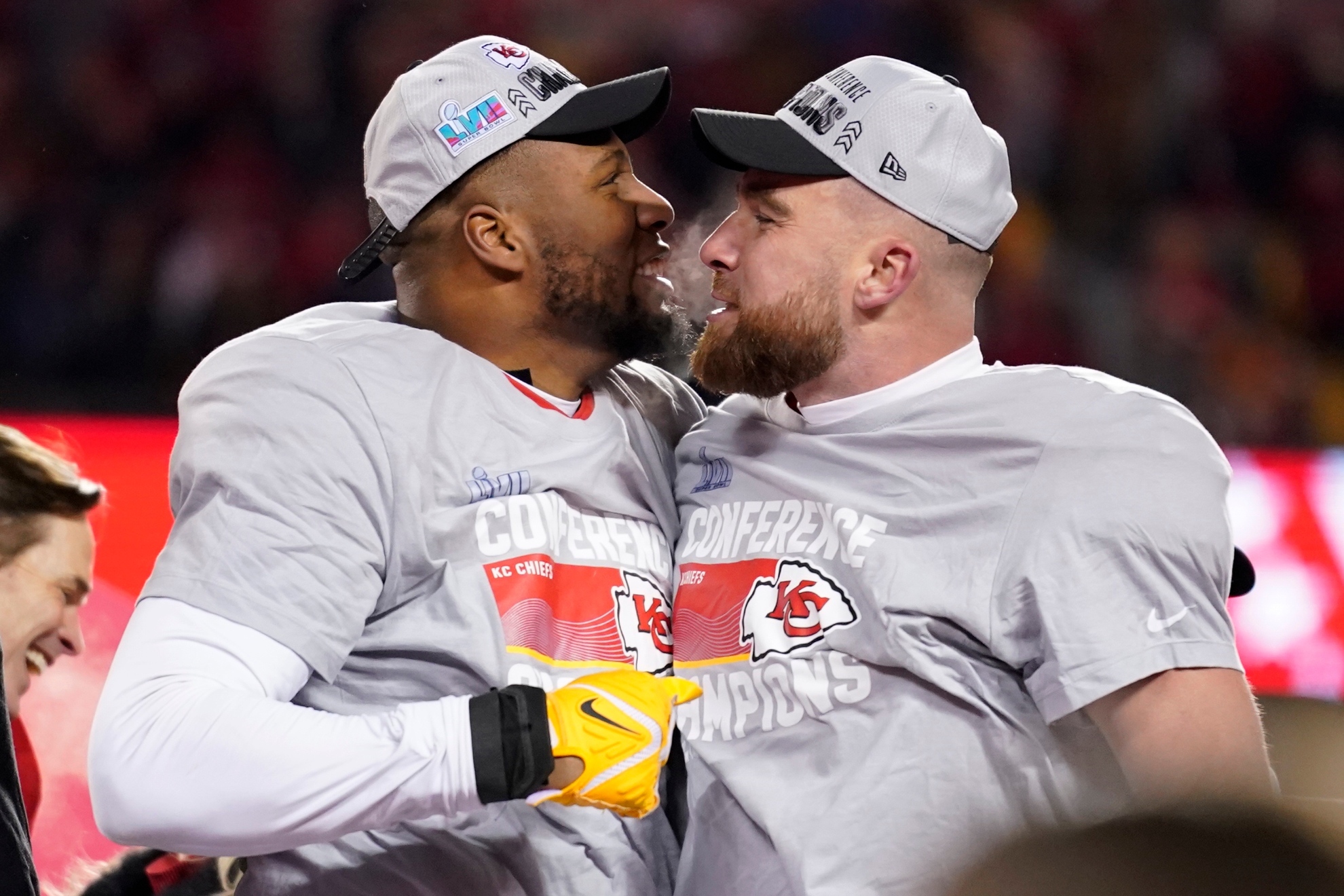 Chris Jones and Travis Kelce celebrate their Super Bowl win.