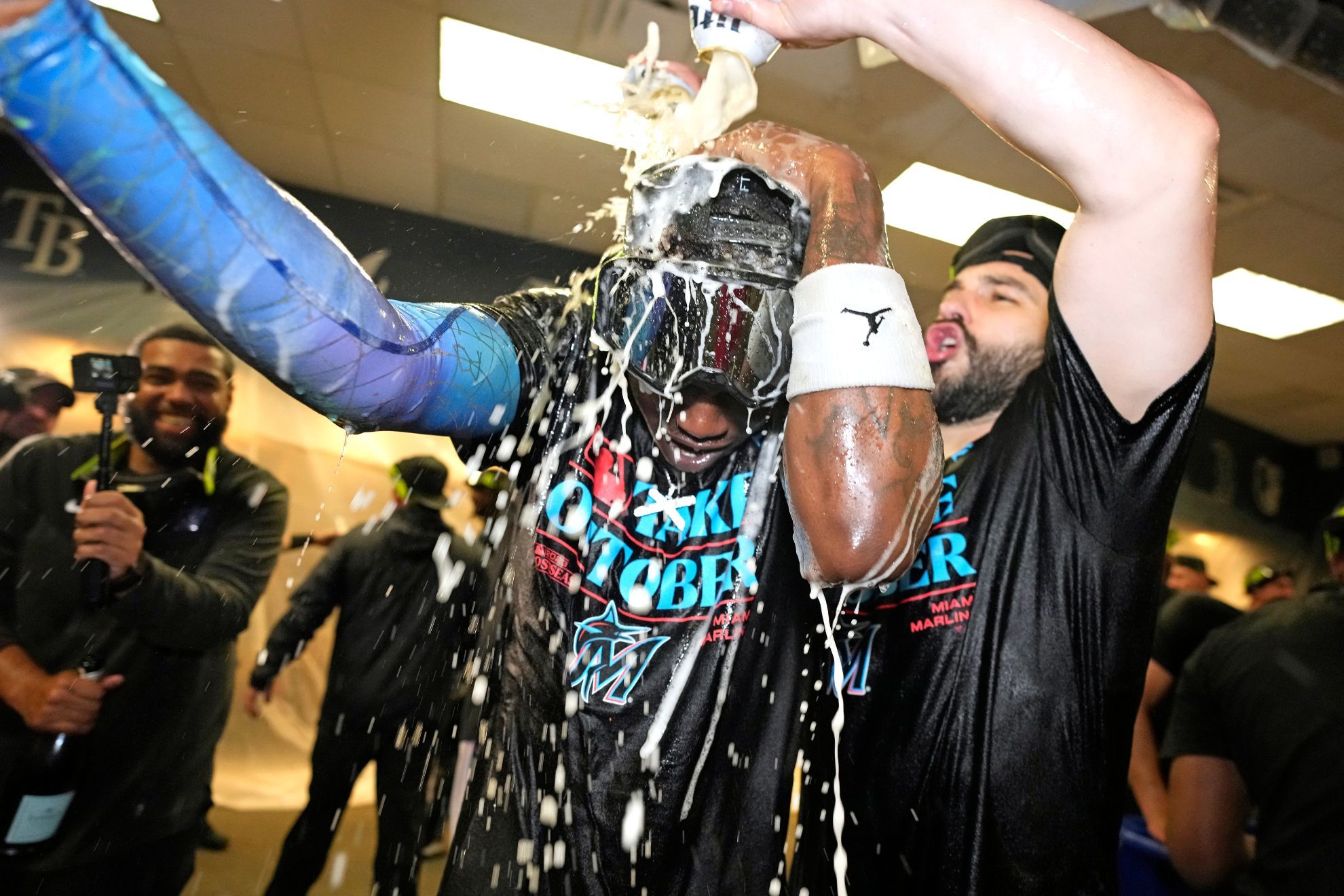 Marlins celebrate fourth playoffs berth in franchise history with champagne showers