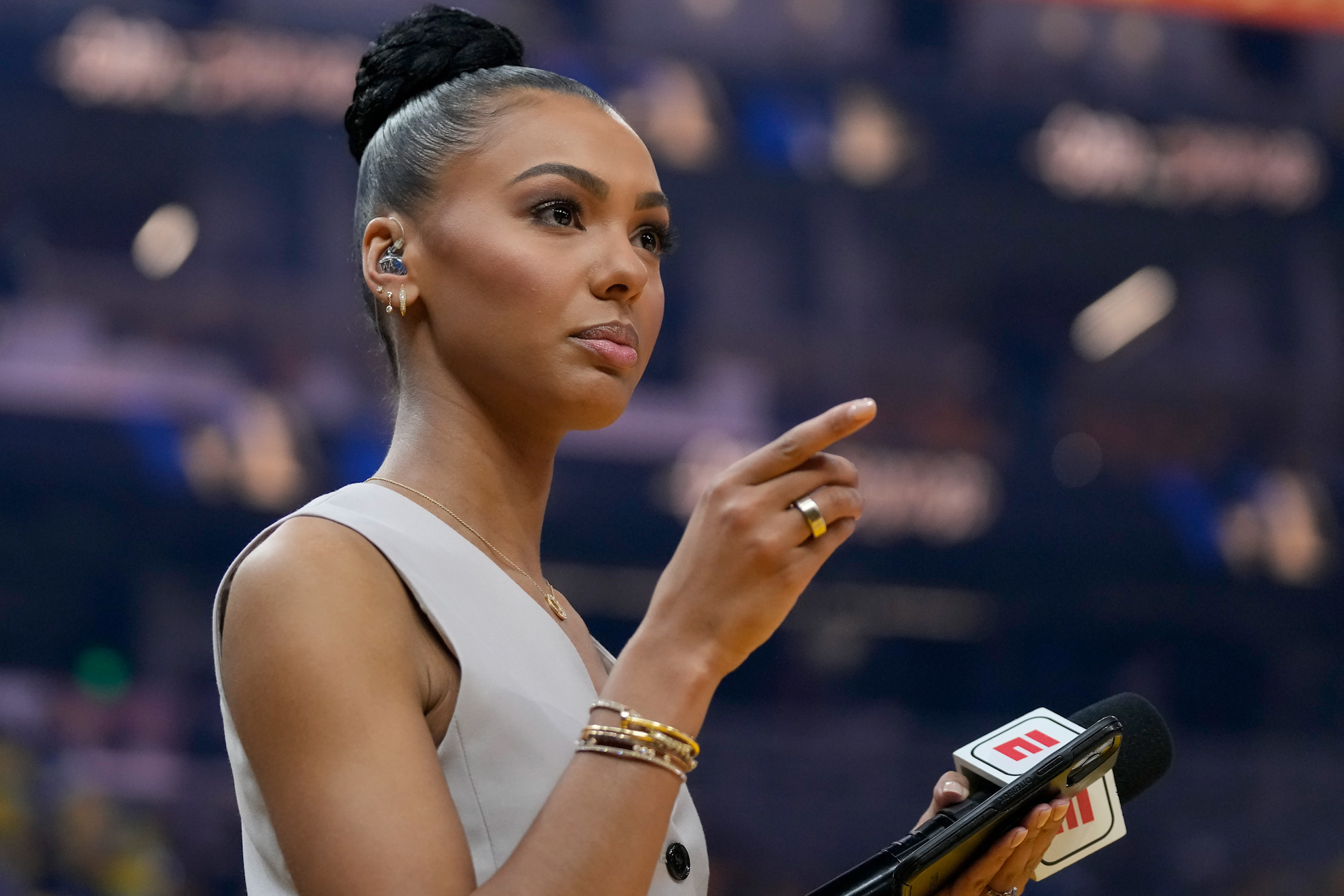 Malika Andrews says a man has been terrorizing her and other ESPN on-air talent -- including Stephen A. Smith