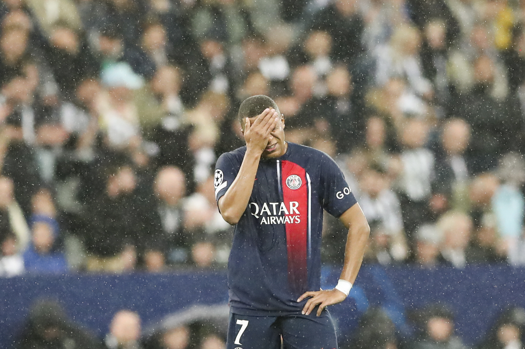 Kylian Mbappe touches his face during the Champions League defeat