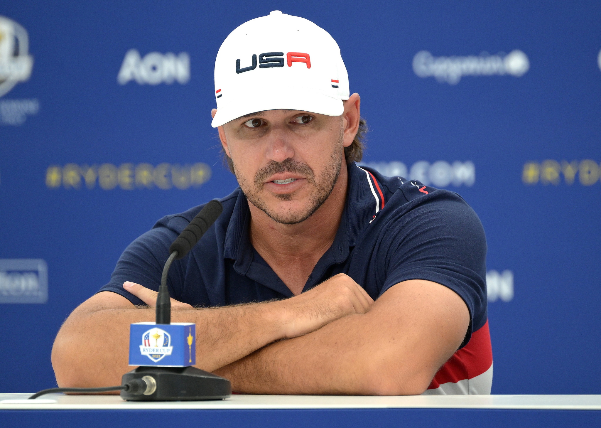 Brooks Koepka attends a press conference during the 2023 Ryder Cup