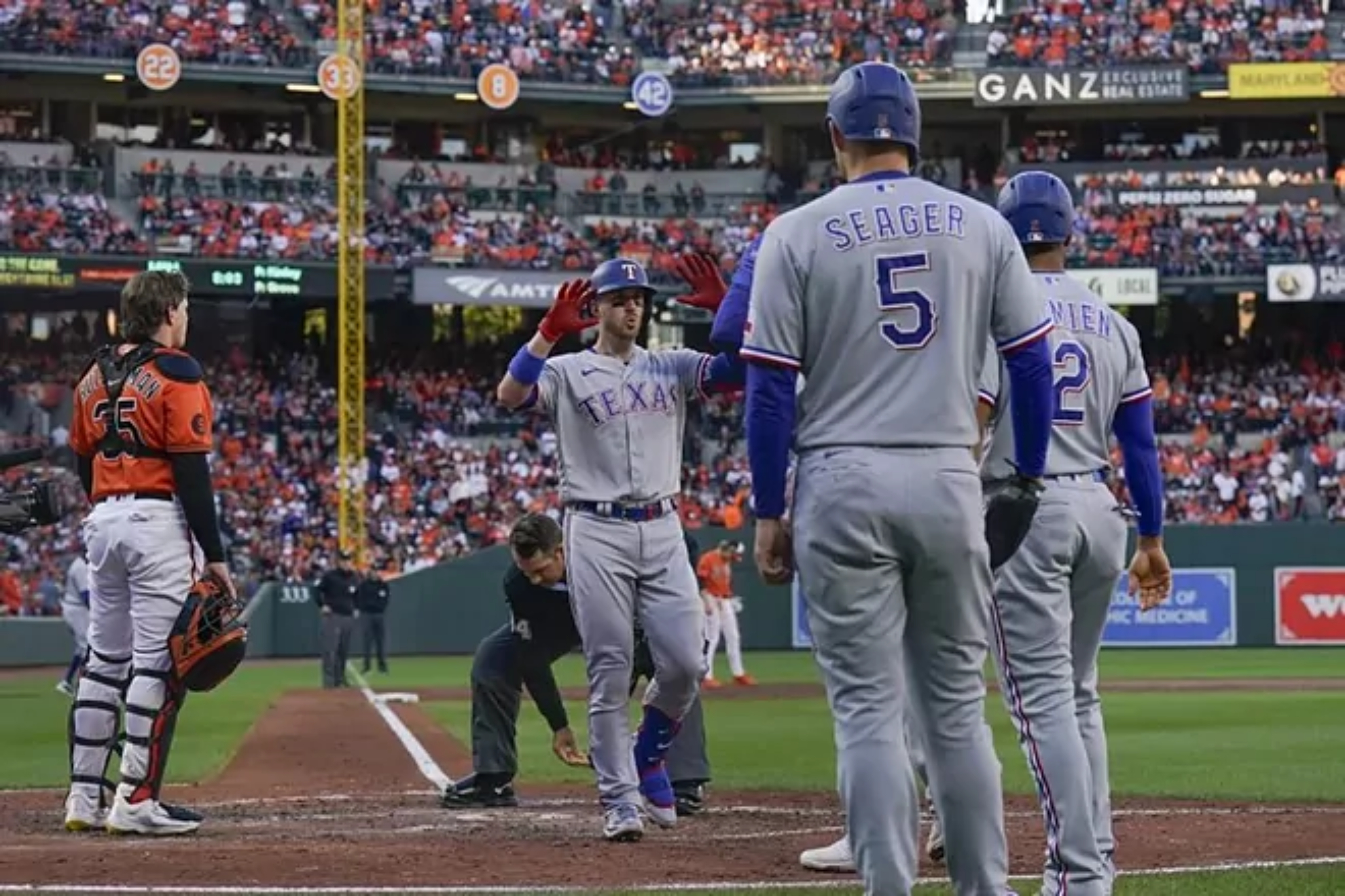 MLB Playoffs: Rangers dominate Orioles with Garvers impressive grand slam, head home with a 2-0 lead