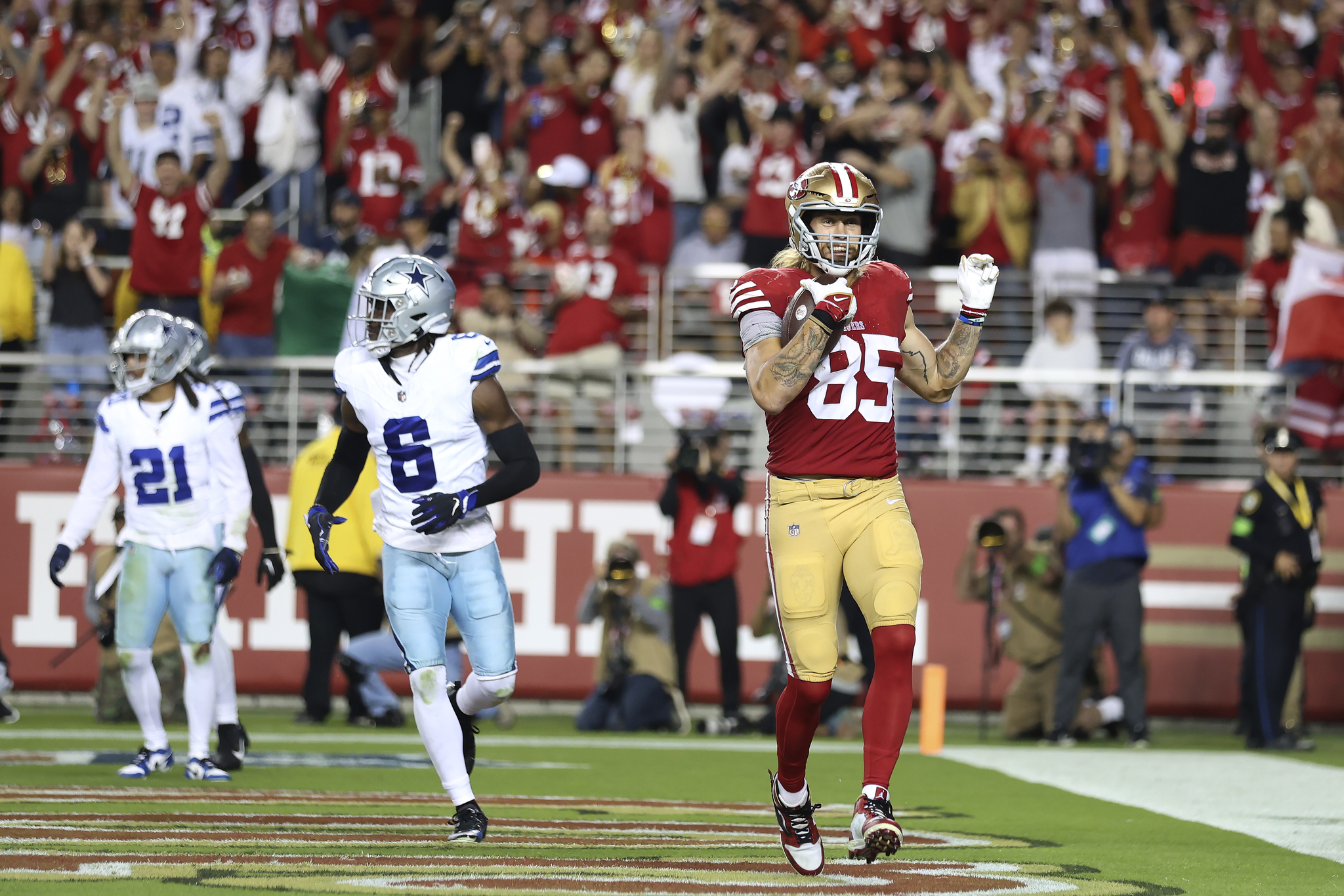 George Kittle celebrates one of his 3 TDs against the Dallas Cowboys on Sunday Night Football.
