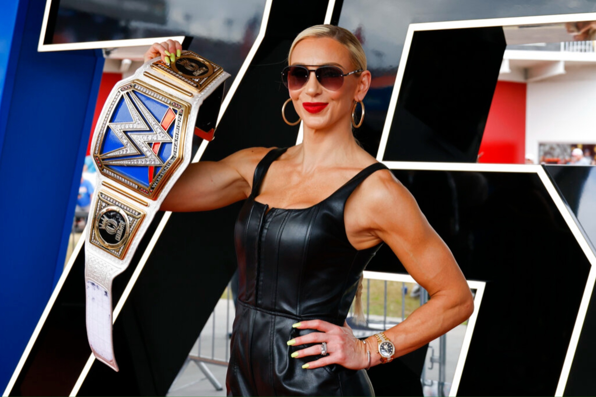 Charlotte Flair holds 14 WWE titles.