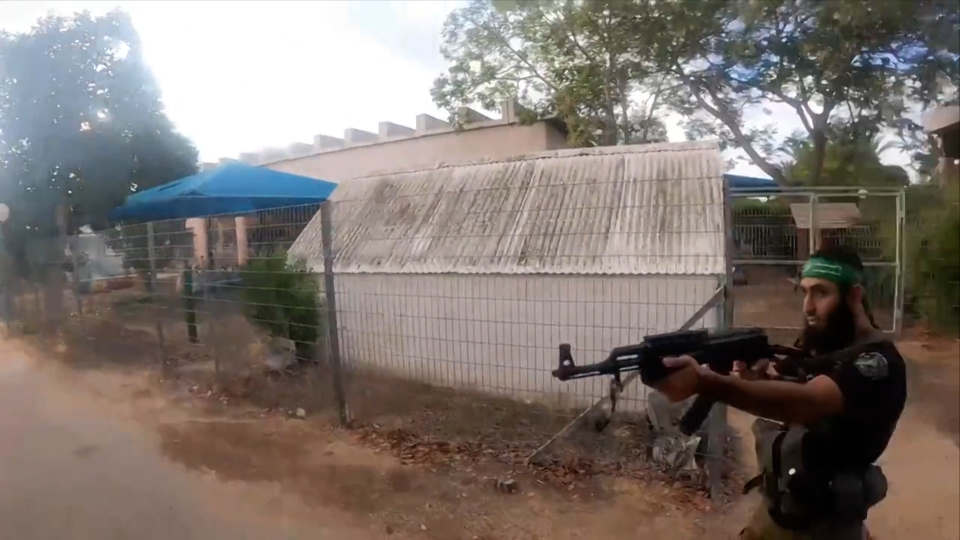First-person GoPro footage shows Hamas militants attacking Isreali village before being shot by IDF