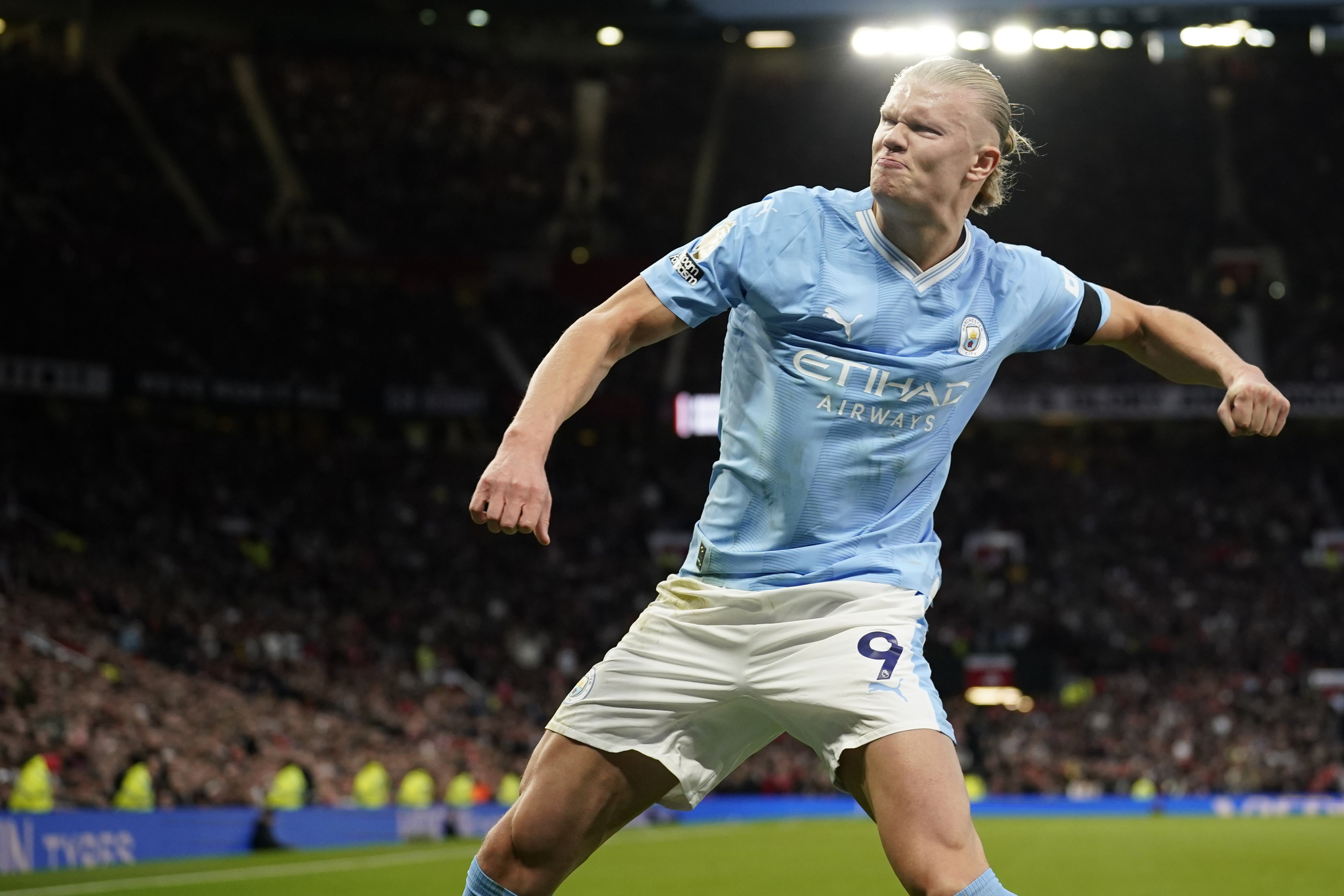 Manchester City's Erling Haaland celebrates after scoring the opening goal