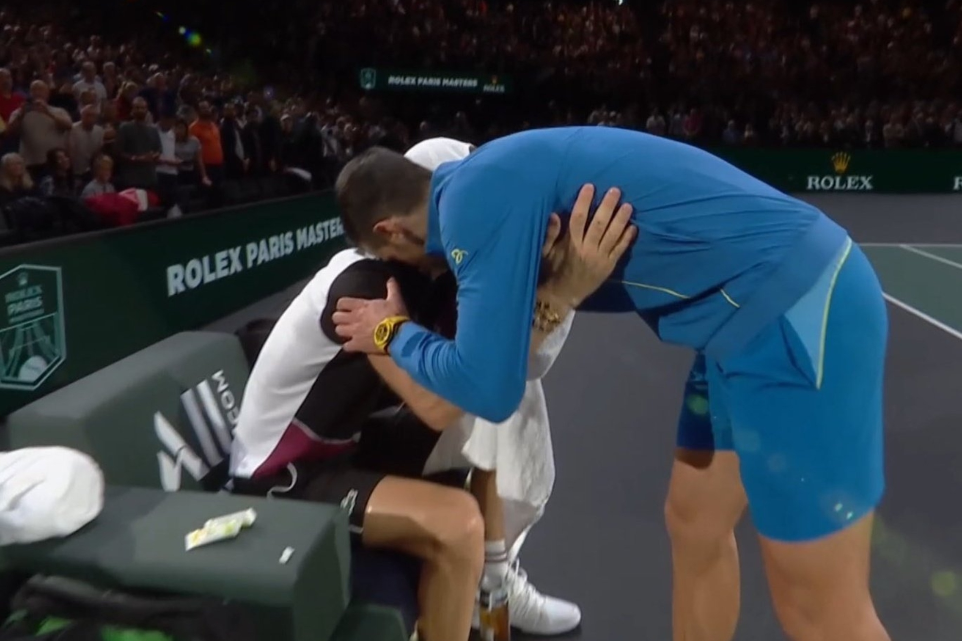 Novak Djokovic consoles Grigor Dimitrov