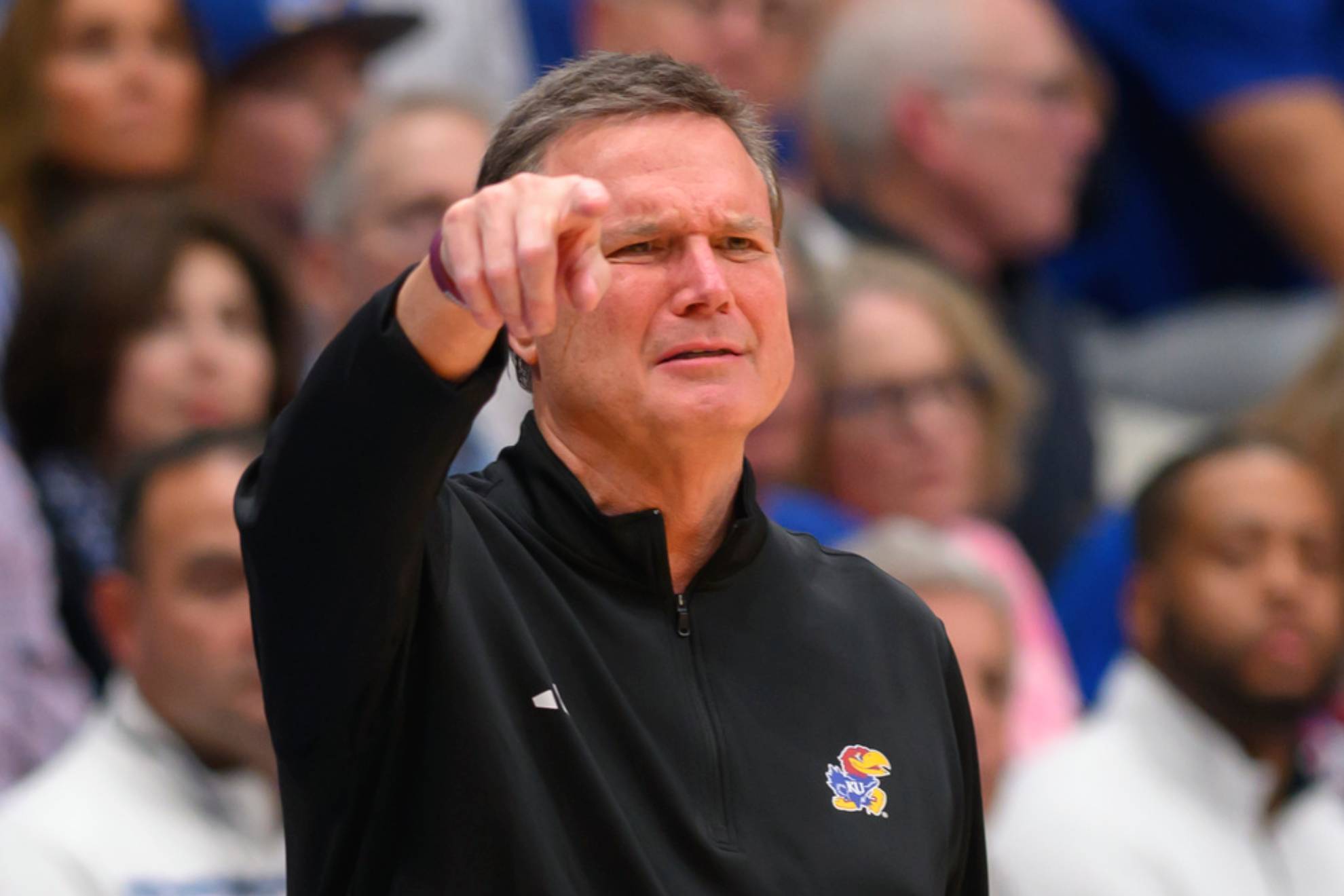 Kansas head coach Bill Self calls directions to his team