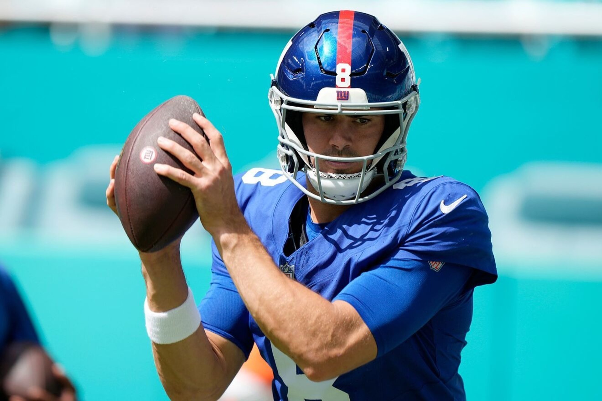 Daniel Jones warms up before an NFL football game against the Miami Dolphins
