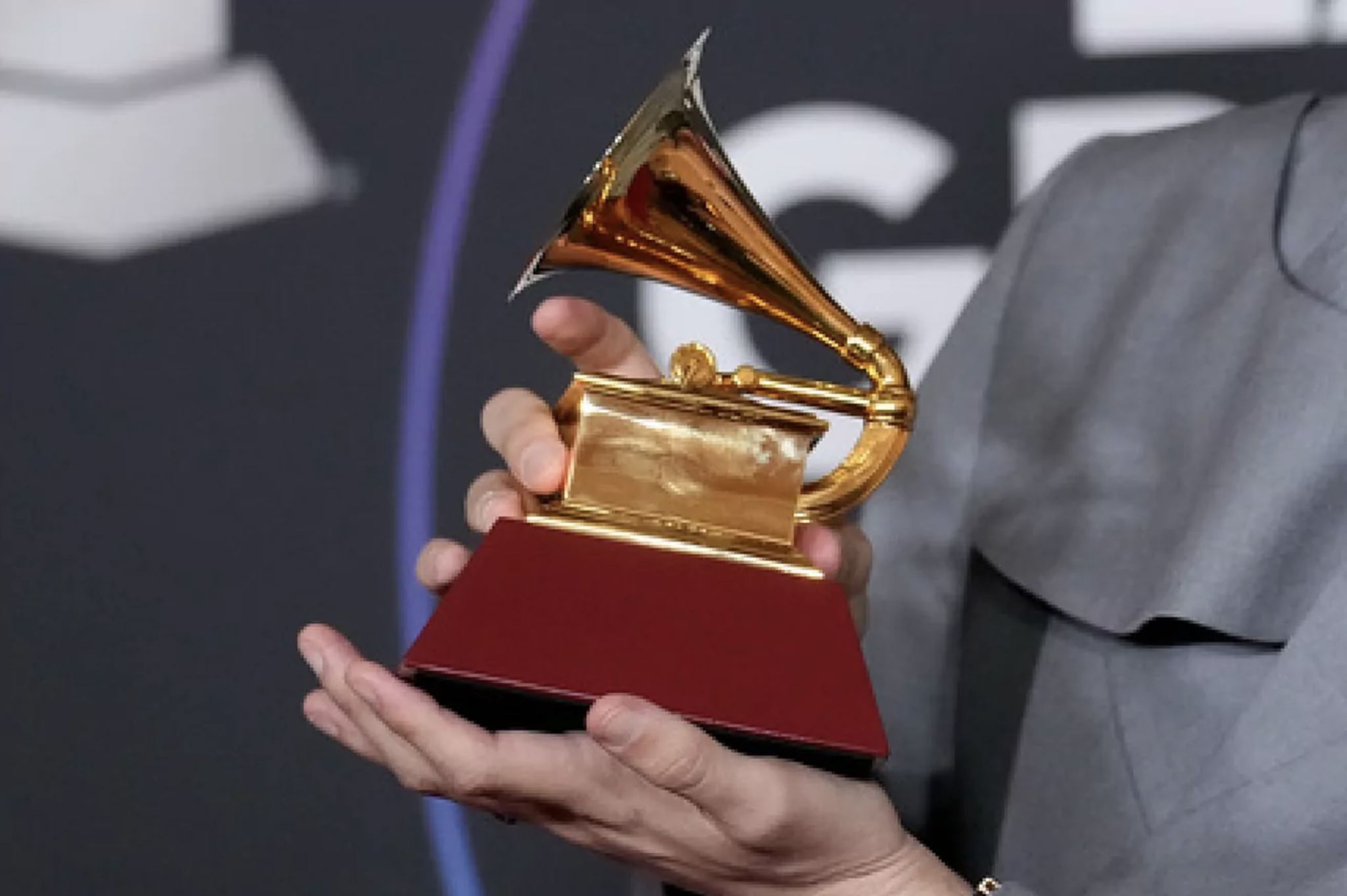 How much is a Latin Grammy worth and how much does the statuette weigh?