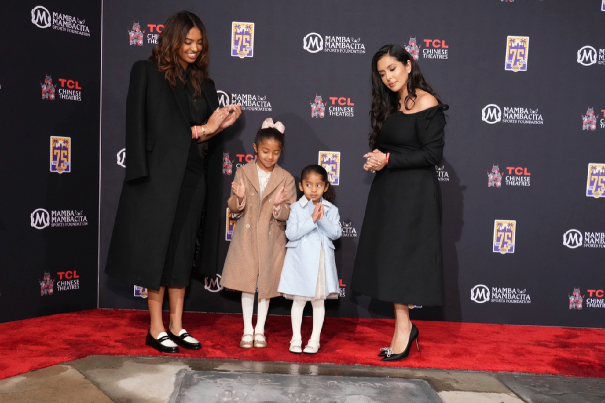 Daugthers Natalia, from left, Bianka and Capri, and wife Vanessa attend a ceremony honoring Kobe Bryant