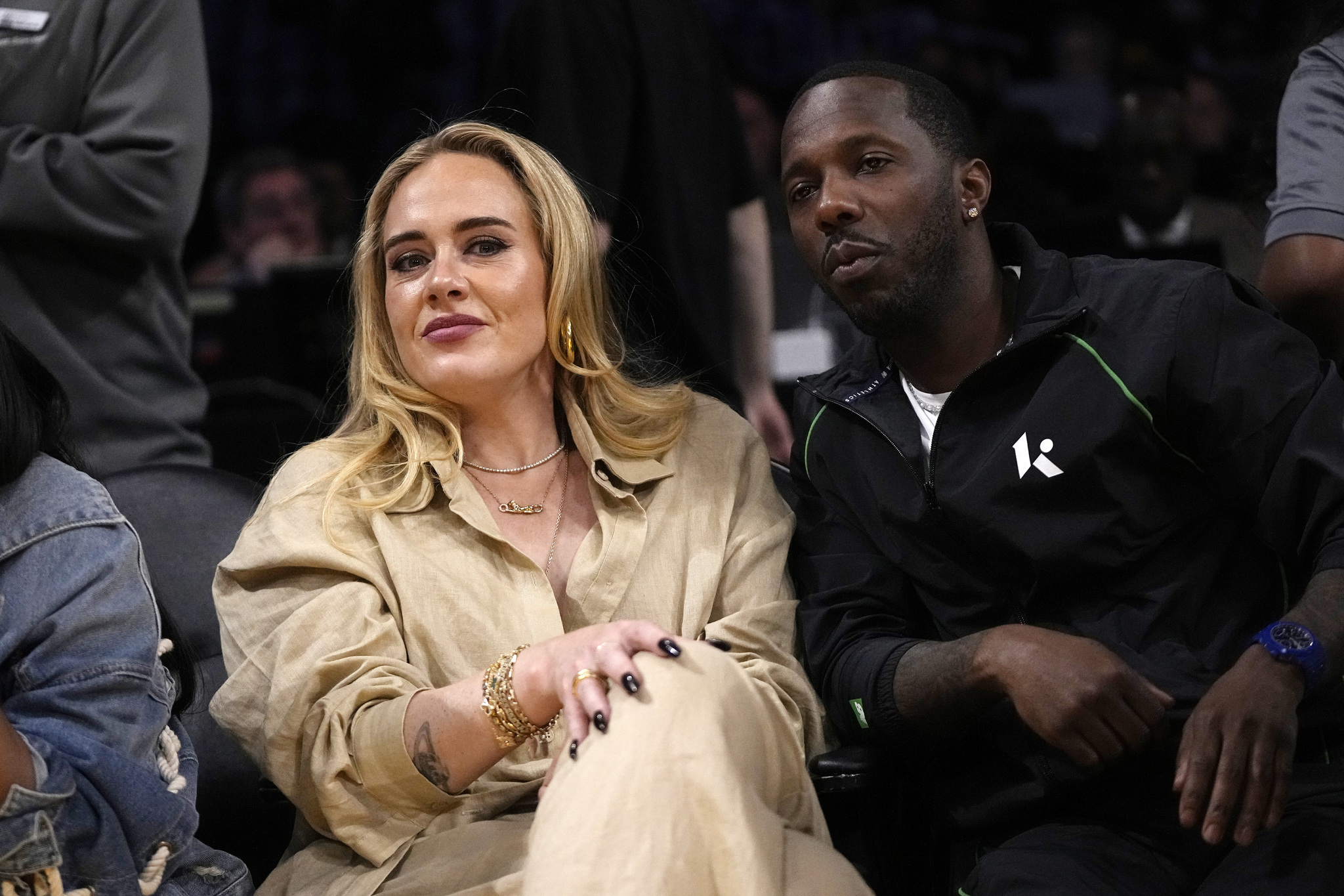 Singer Adele, left, with sports agent Rich Paul