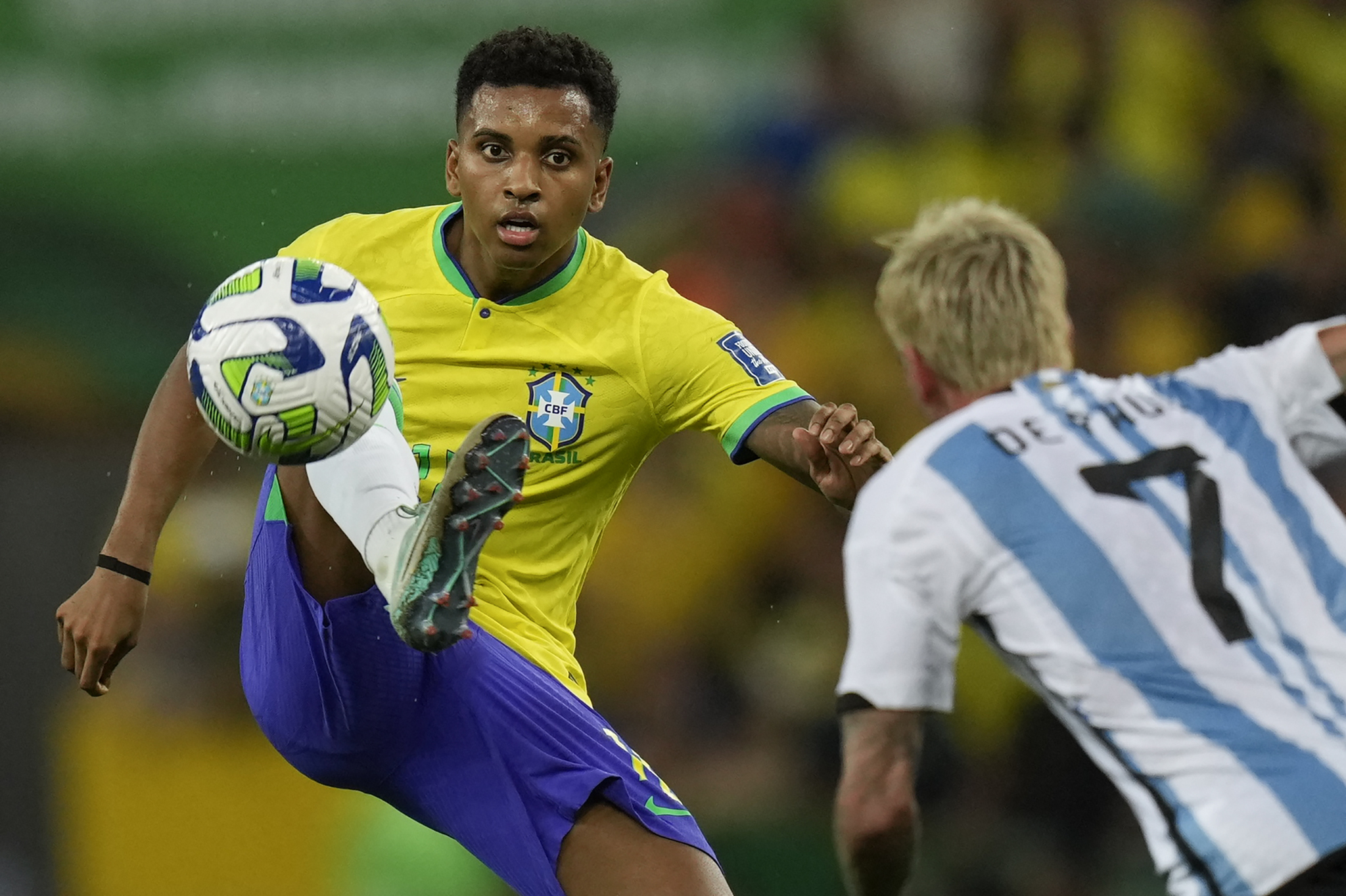 Brazils Rodrygo controls the ball challenged by Argentinas Rodrigo De Paul