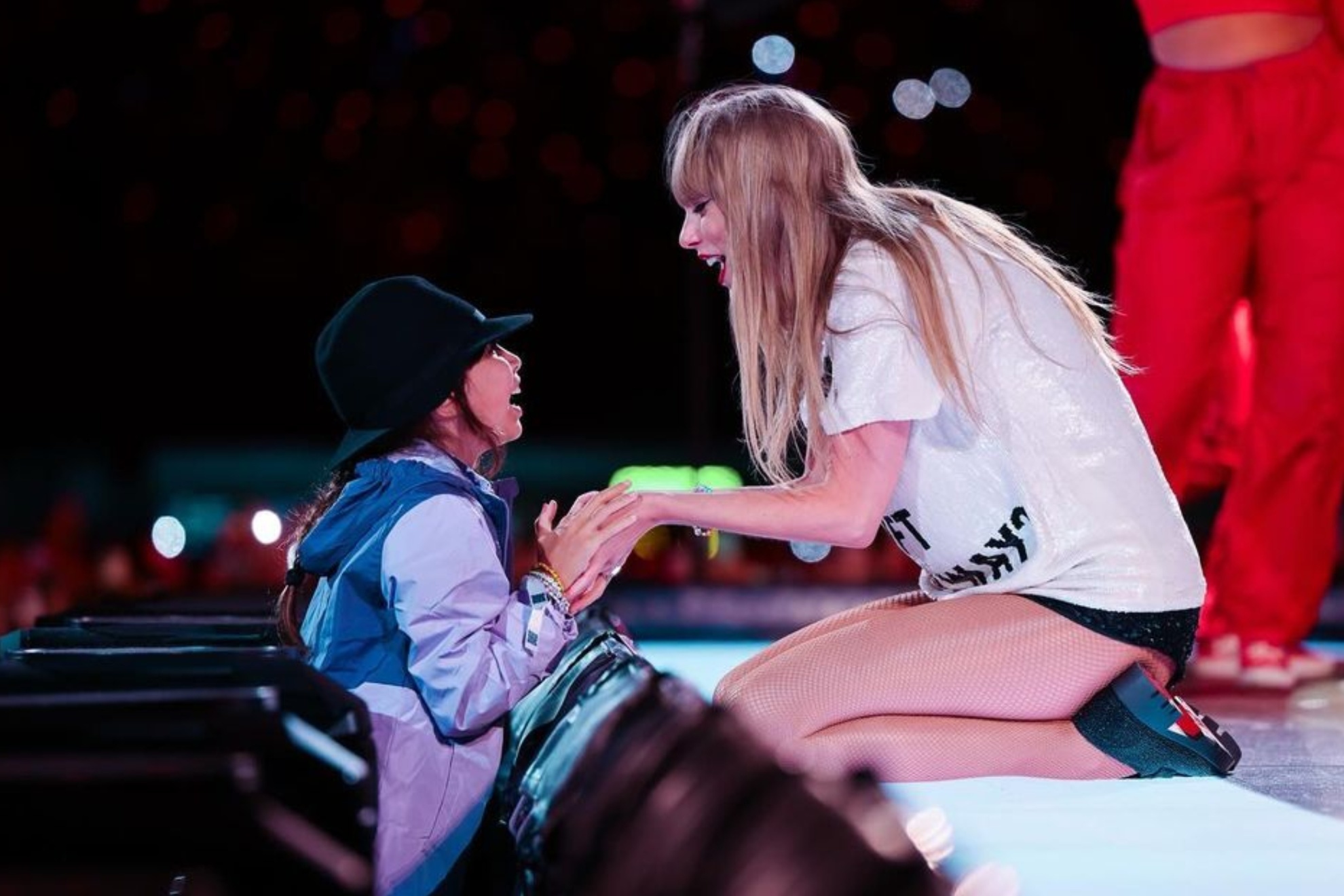 Taylow Swift gives away her hat during the performance of the song "22" in the Eras Tour