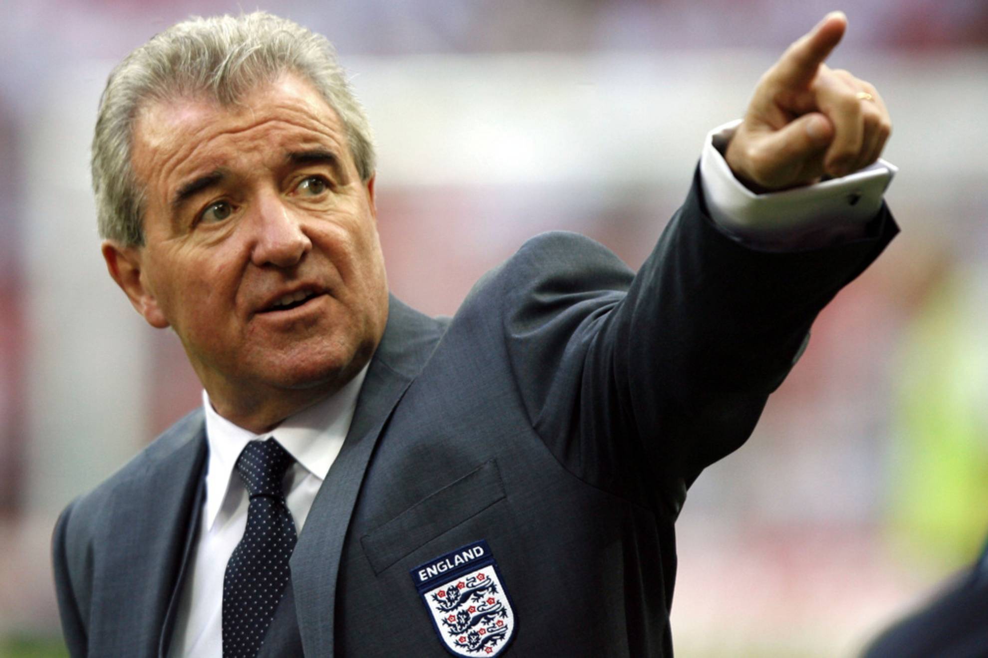 Terry Venables points before their international friendly soccer match against Brazil /