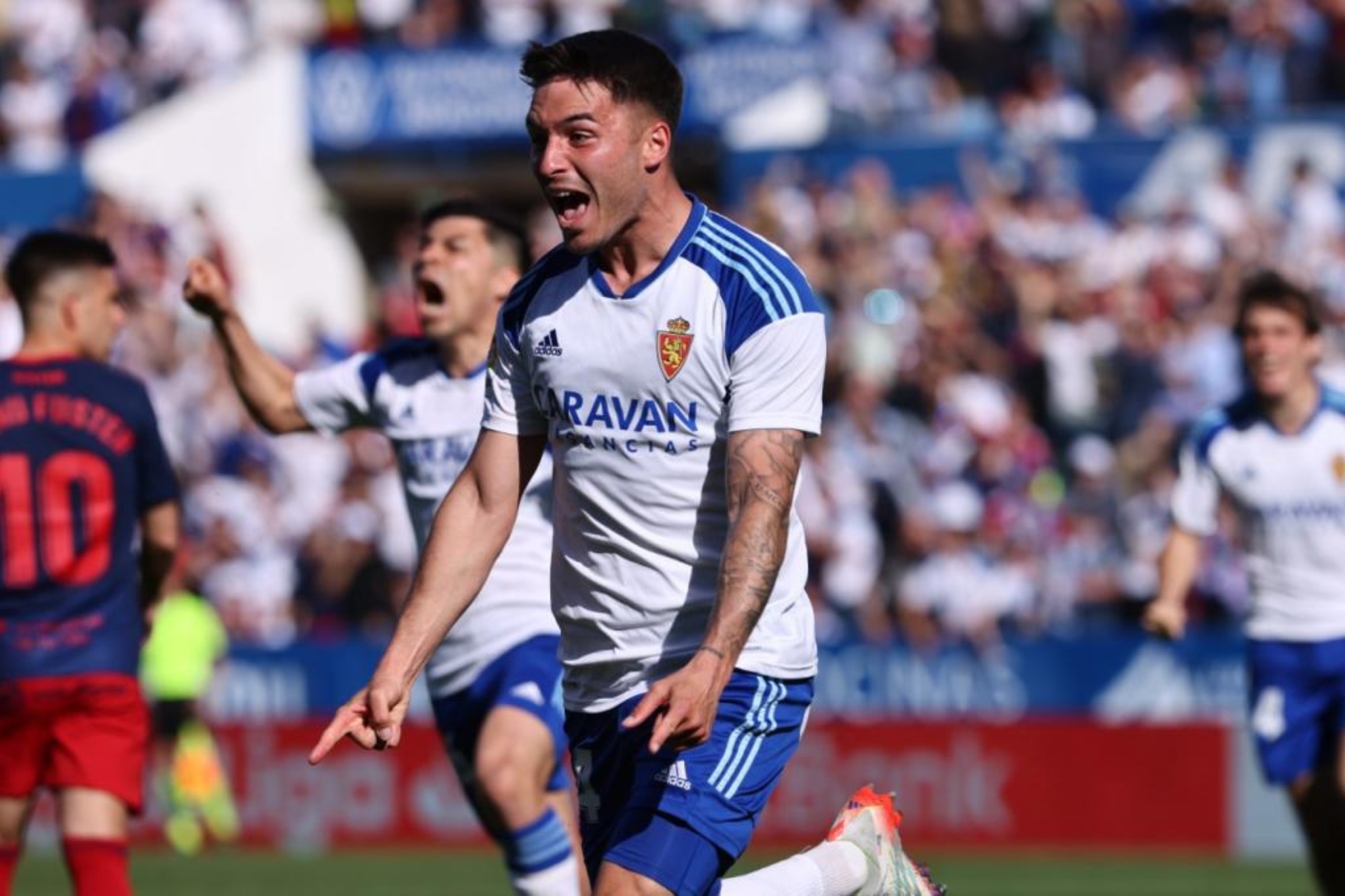 Lluís López celebra un gol con el Zaragoza.
