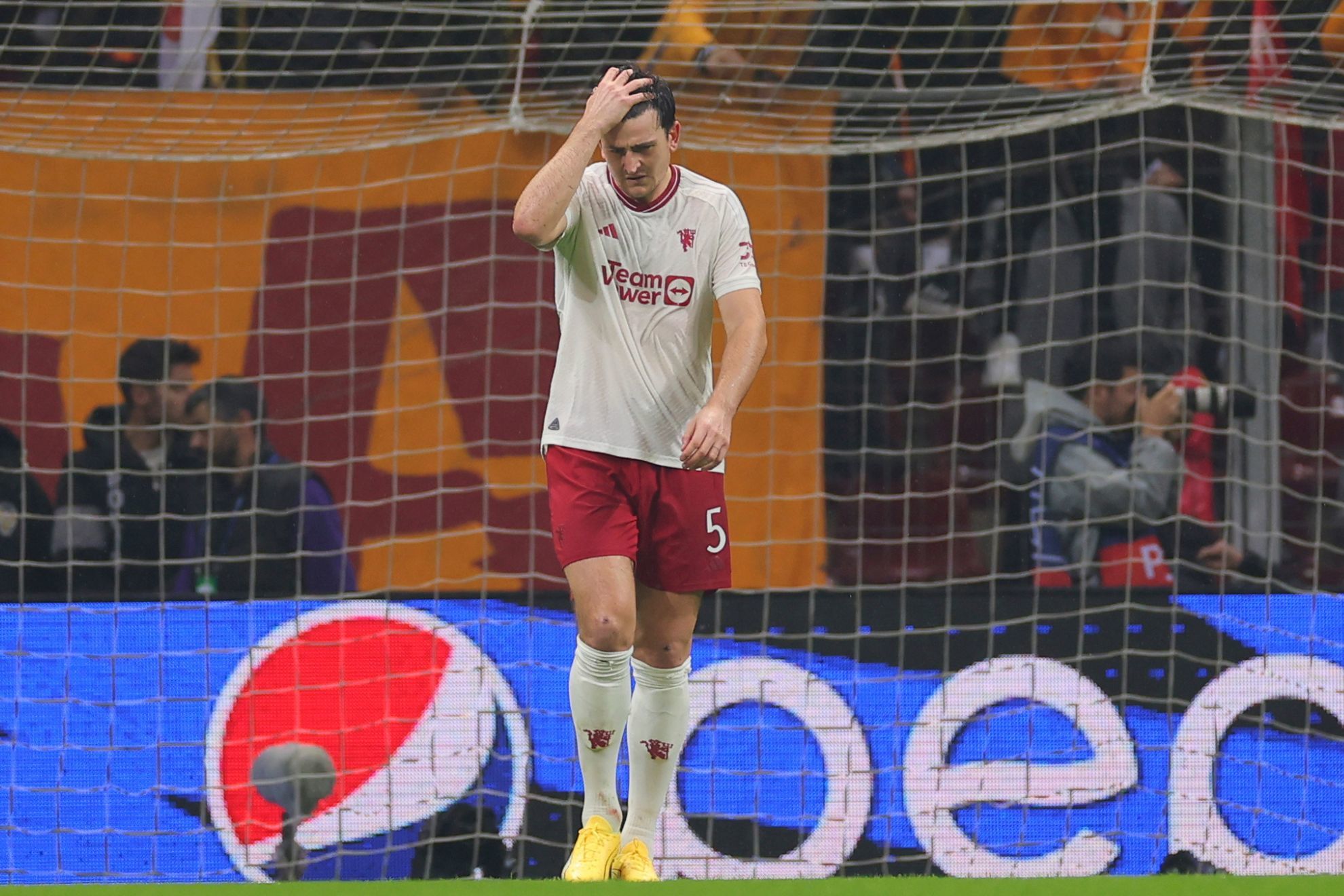 Harry Maguire reacts after Galatasarays Kerem Akturkoglu scored his sides third goal