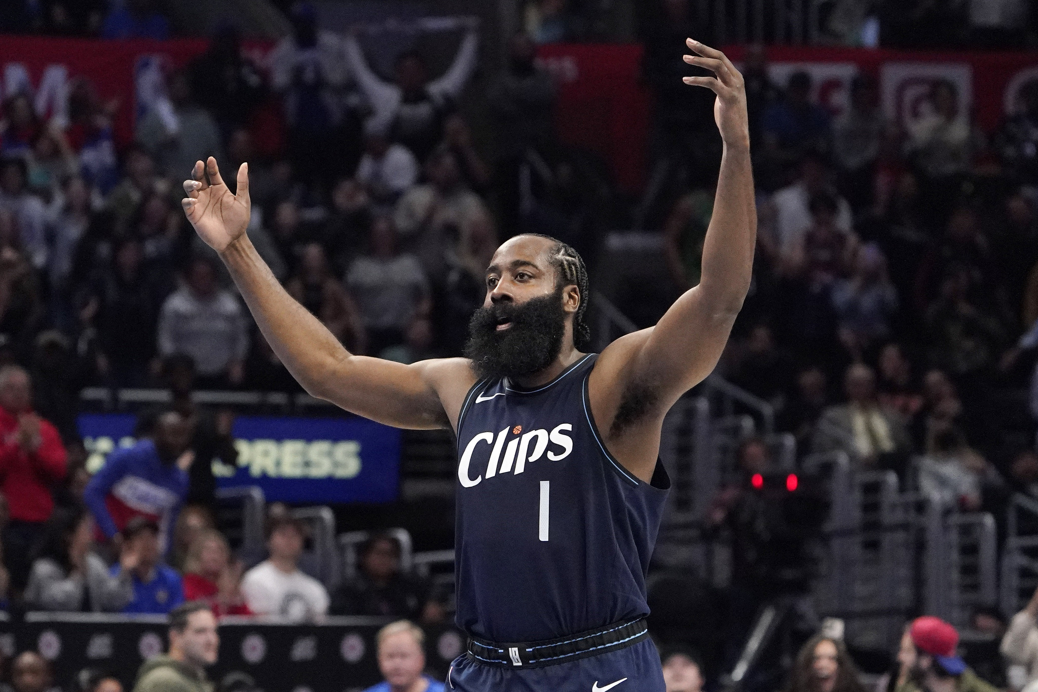 Los Angeles Clippers guard James Harden celebrates after scoring